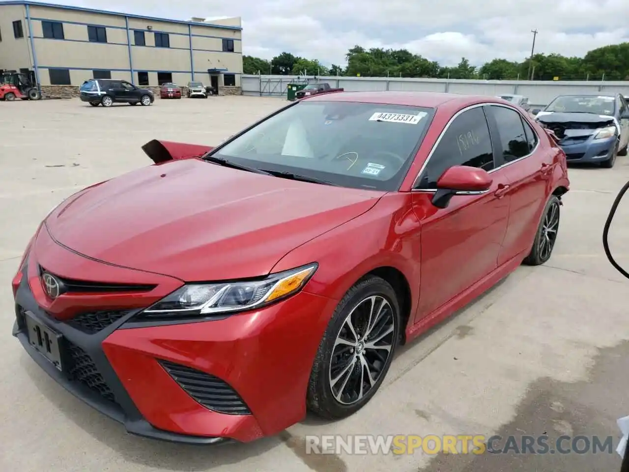 2 Photograph of a damaged car 4T1B11HK0KU189693 TOYOTA CAMRY 2019