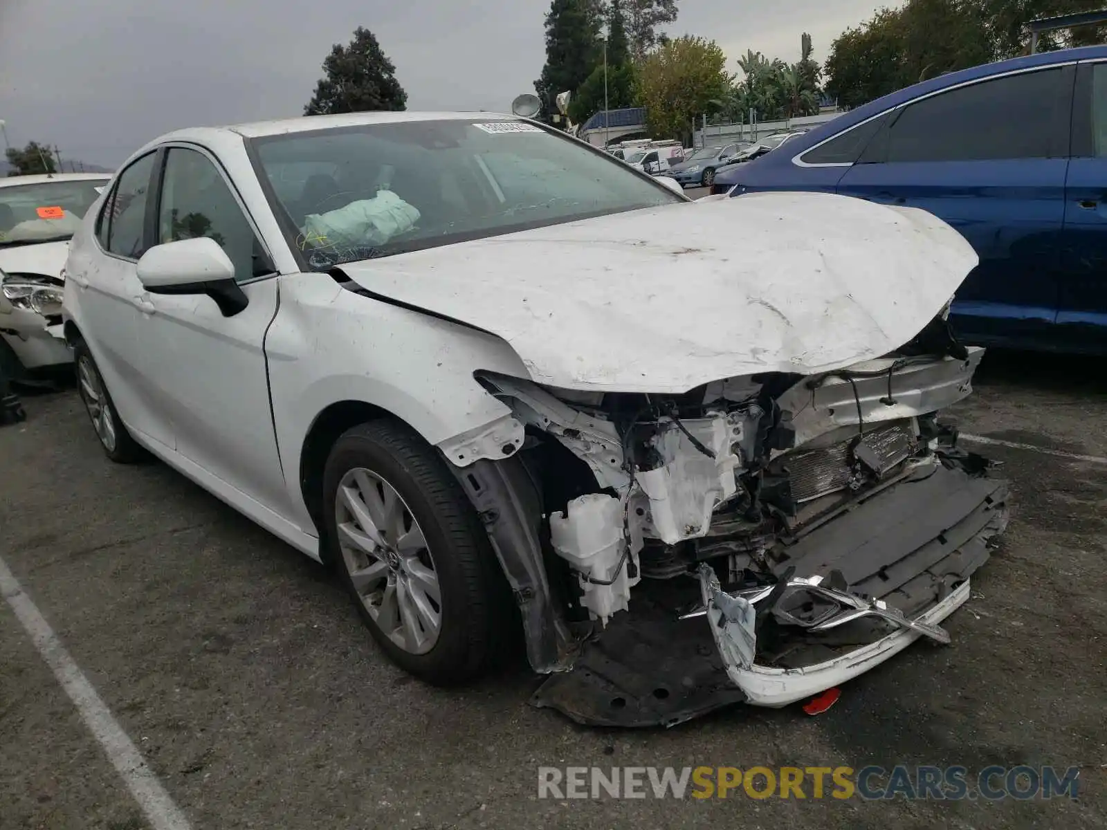 1 Photograph of a damaged car 4T1B11HK0KU192674 TOYOTA CAMRY 2019