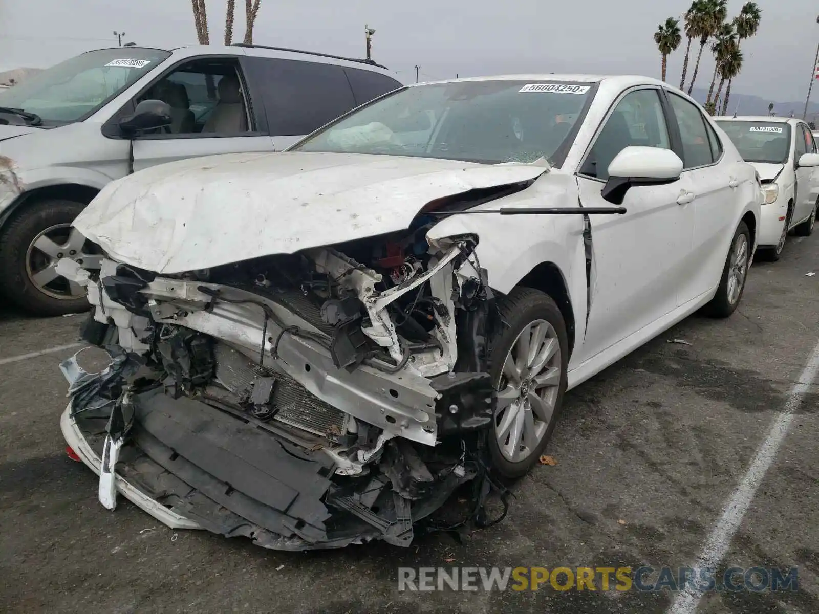 2 Photograph of a damaged car 4T1B11HK0KU192674 TOYOTA CAMRY 2019