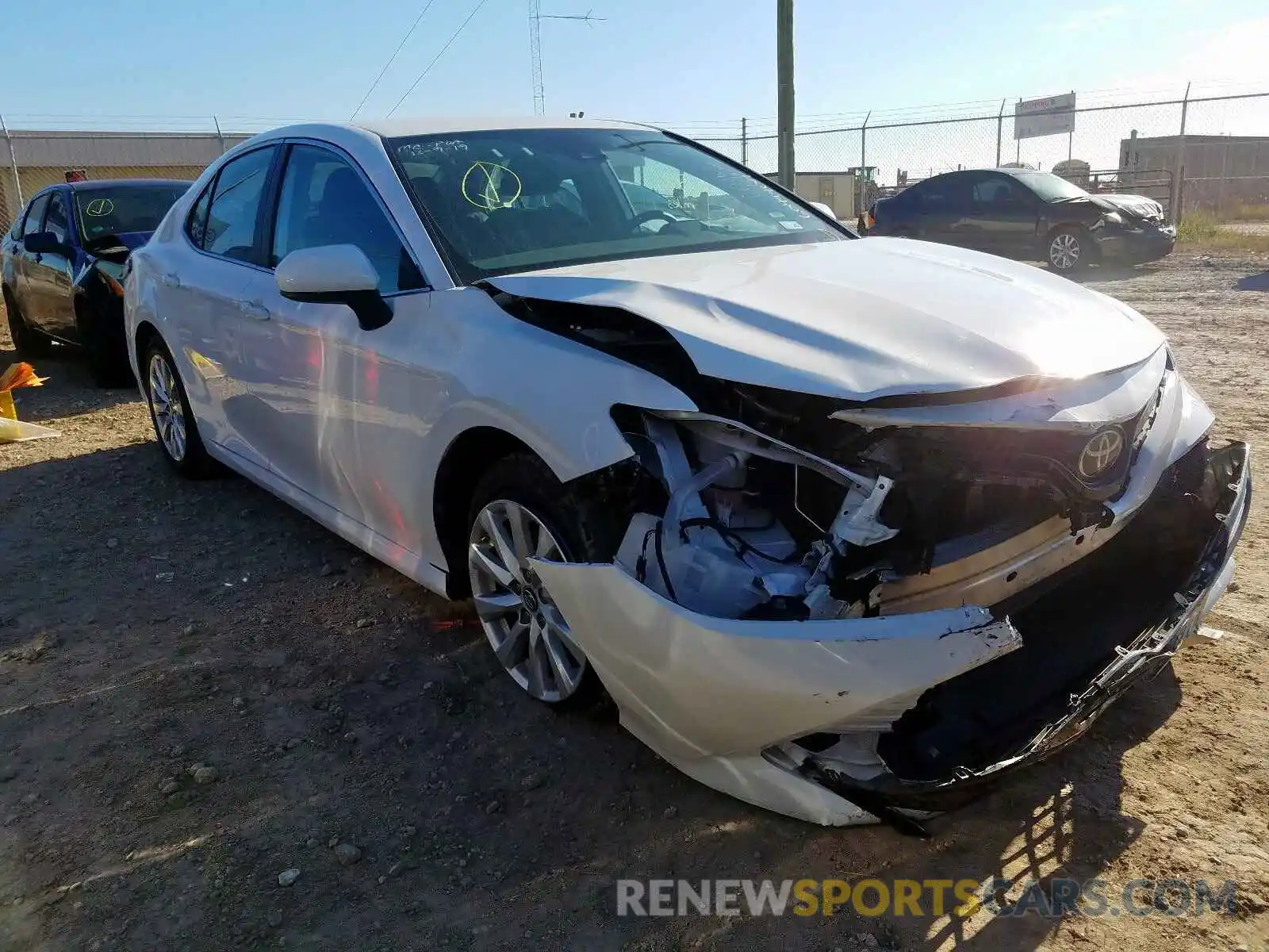 1 Photograph of a damaged car 4T1B11HK0KU193615 TOYOTA CAMRY 2019