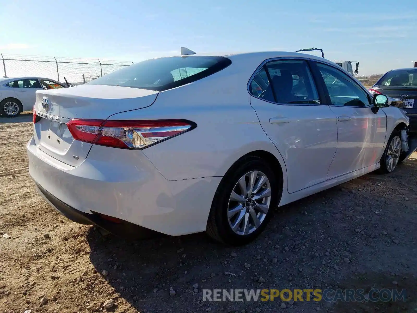 4 Photograph of a damaged car 4T1B11HK0KU193615 TOYOTA CAMRY 2019