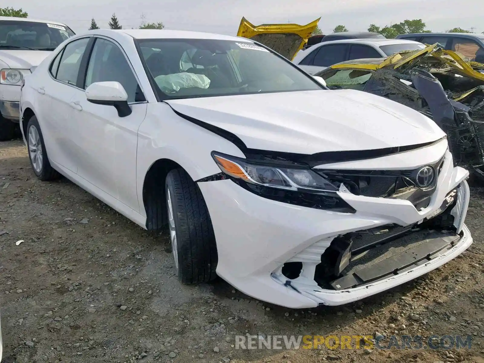 1 Photograph of a damaged car 4T1B11HK0KU194277 TOYOTA CAMRY 2019