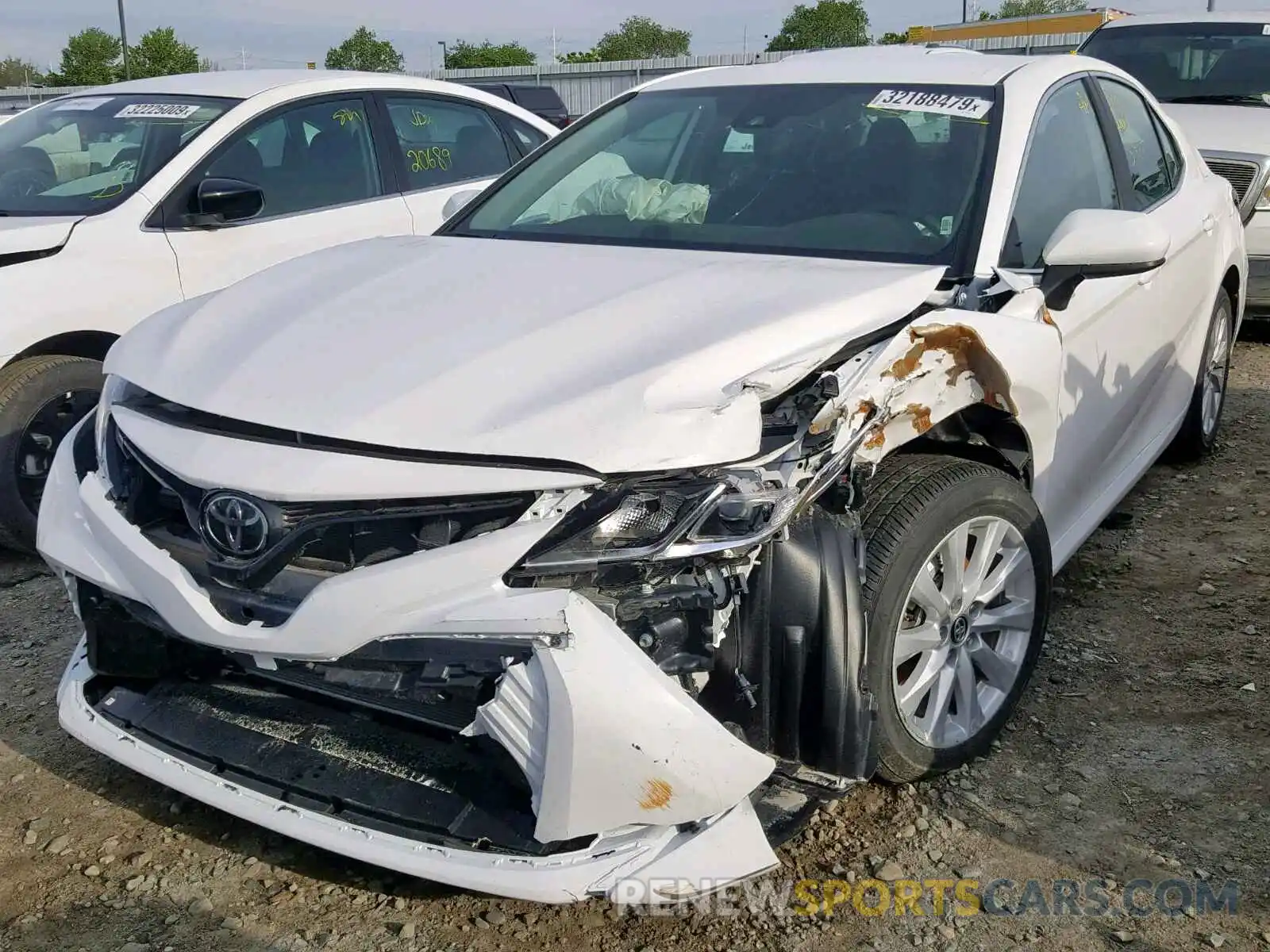 2 Photograph of a damaged car 4T1B11HK0KU194277 TOYOTA CAMRY 2019