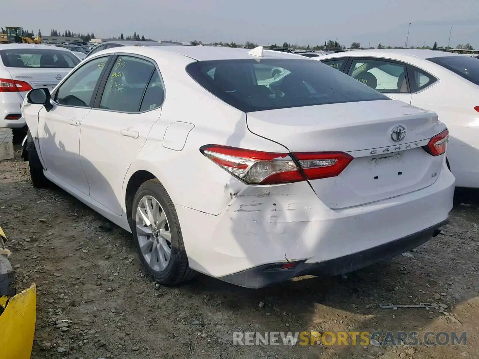 3 Photograph of a damaged car 4T1B11HK0KU194277 TOYOTA CAMRY 2019