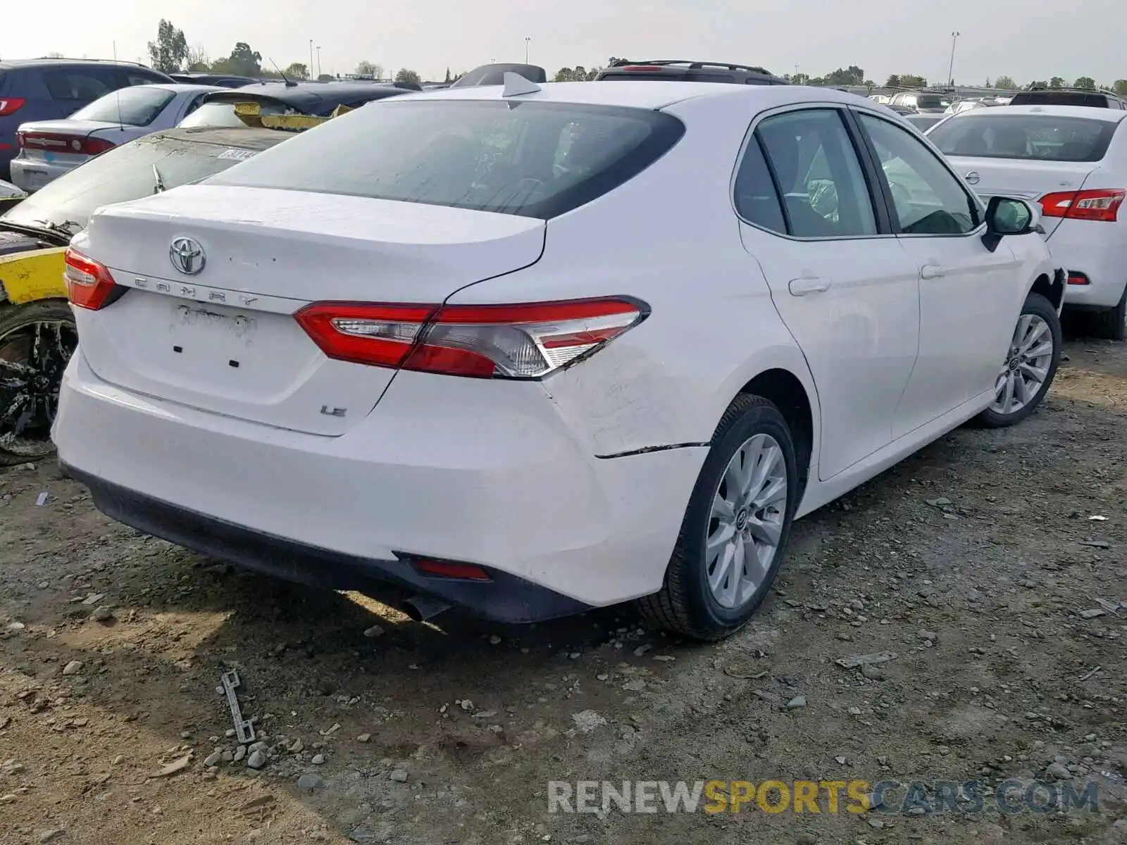 4 Photograph of a damaged car 4T1B11HK0KU194277 TOYOTA CAMRY 2019