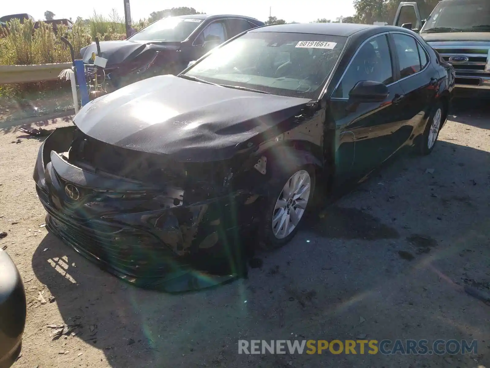 2 Photograph of a damaged car 4T1B11HK0KU194506 TOYOTA CAMRY 2019