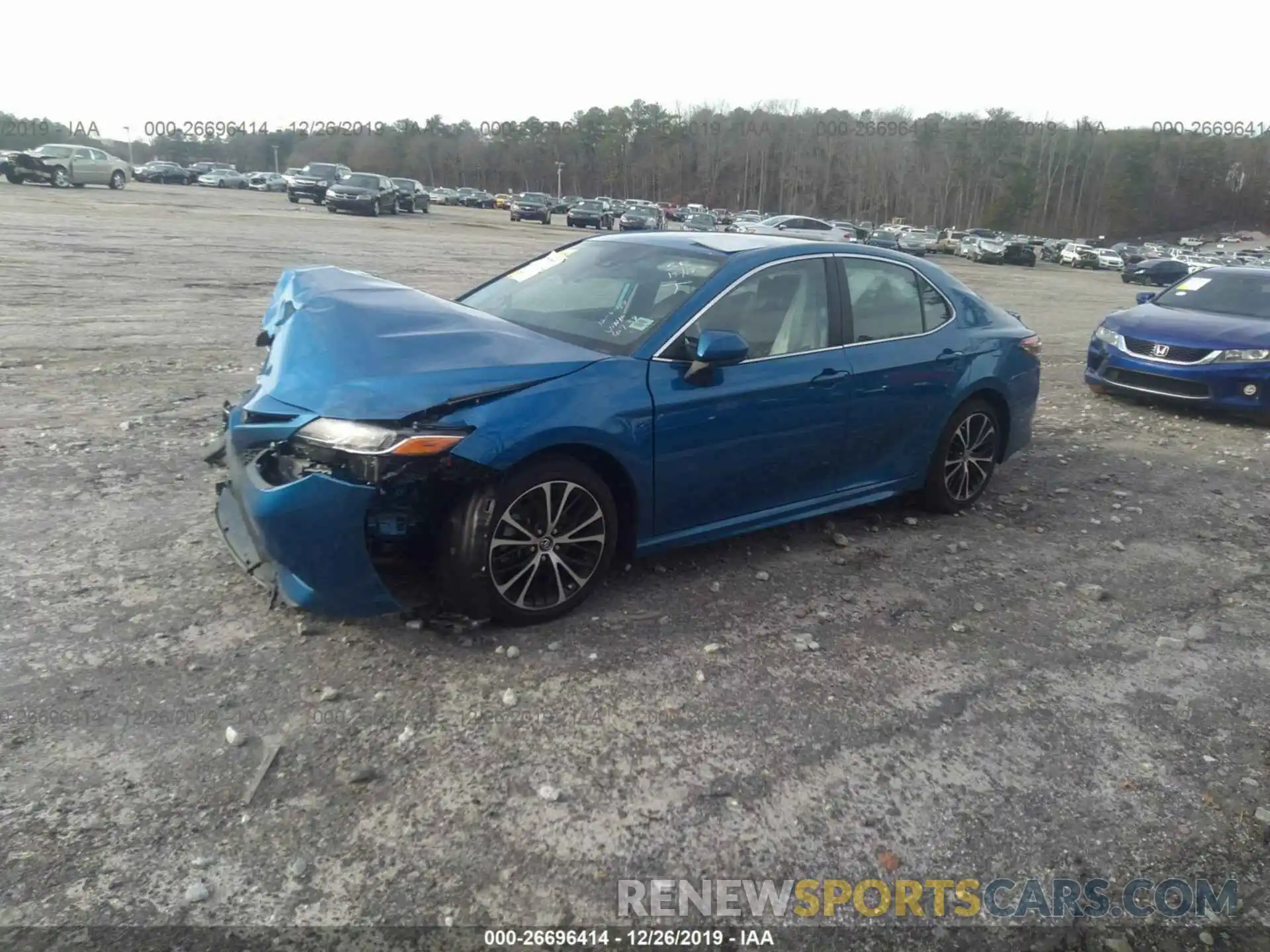 2 Photograph of a damaged car 4T1B11HK0KU196739 TOYOTA CAMRY 2019