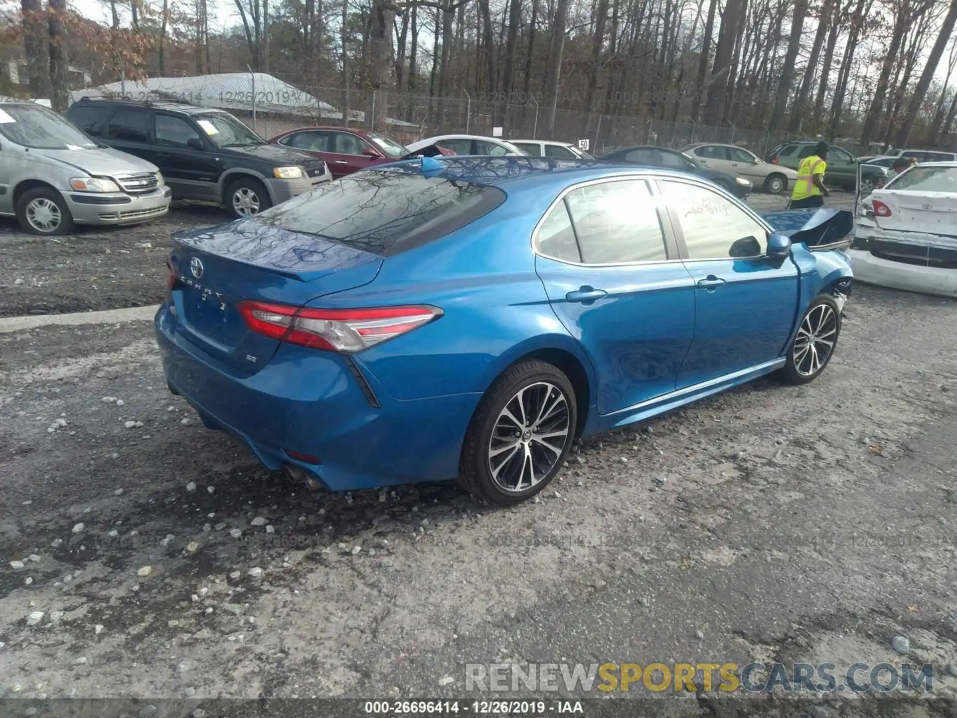 4 Photograph of a damaged car 4T1B11HK0KU196739 TOYOTA CAMRY 2019