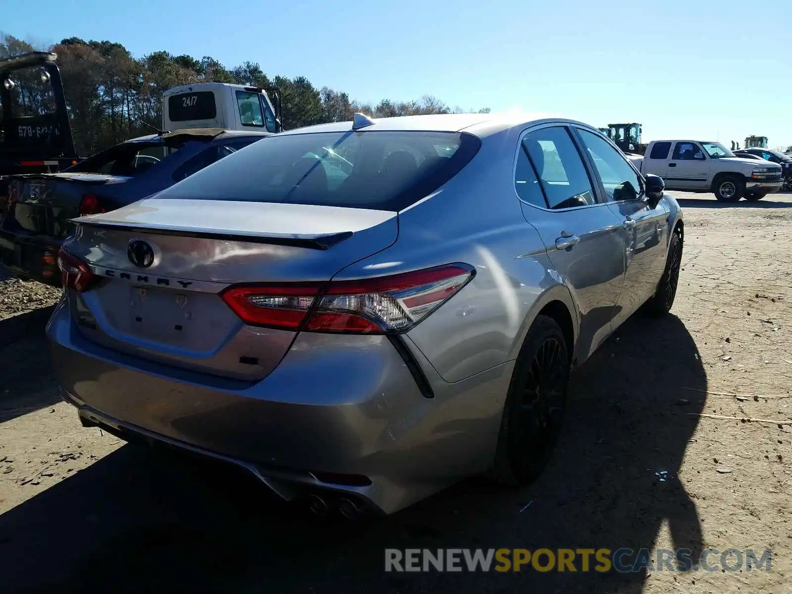 4 Photograph of a damaged car 4T1B11HK0KU197275 TOYOTA CAMRY 2019