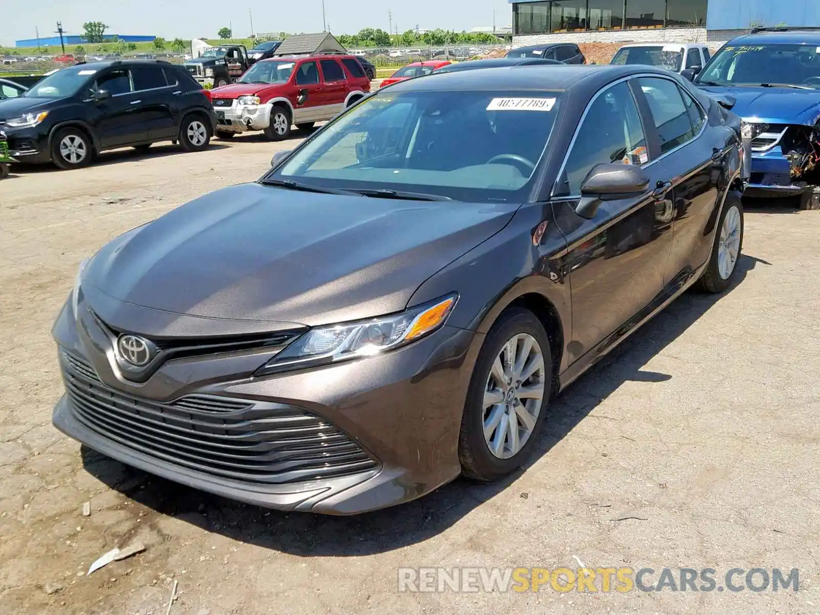 2 Photograph of a damaged car 4T1B11HK0KU199480 TOYOTA CAMRY 2019