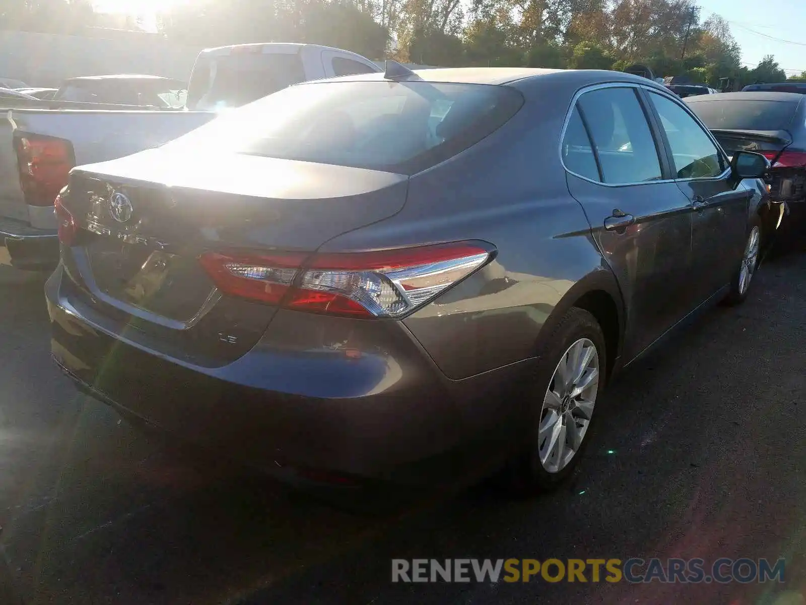 4 Photograph of a damaged car 4T1B11HK0KU203754 TOYOTA CAMRY 2019