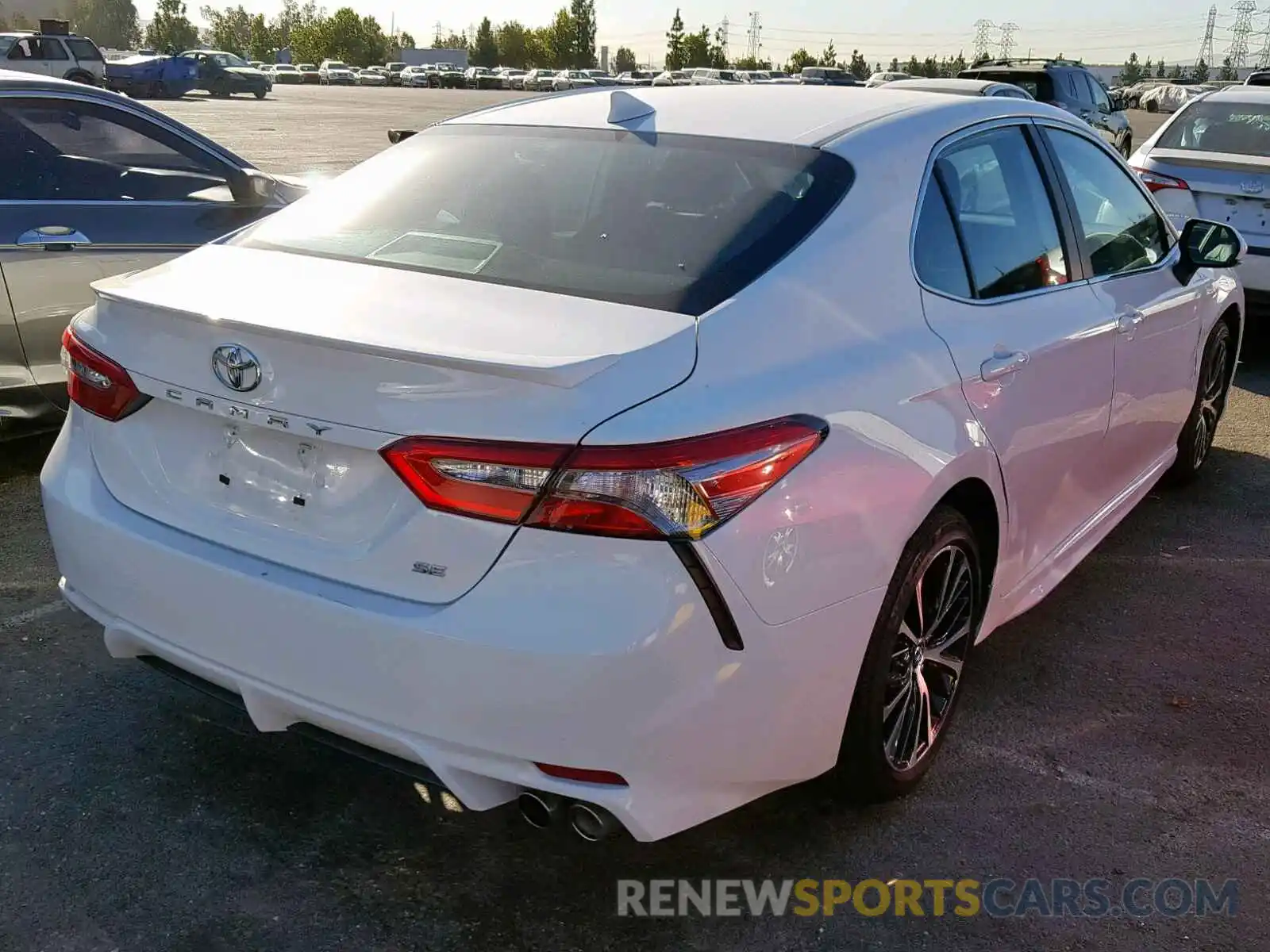 4 Photograph of a damaged car 4T1B11HK0KU204001 TOYOTA CAMRY 2019