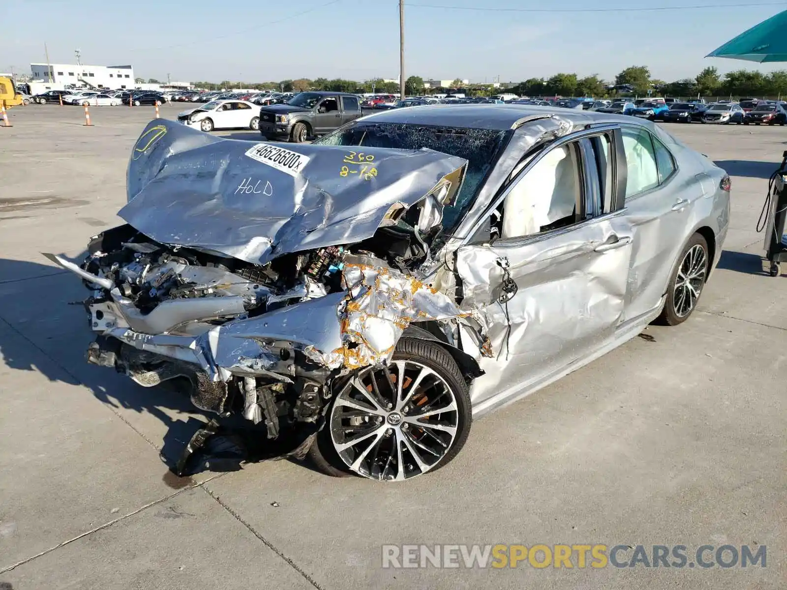 2 Photograph of a damaged car 4T1B11HK0KU206721 TOYOTA CAMRY 2019