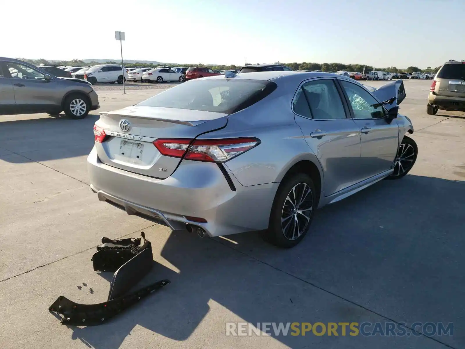 4 Photograph of a damaged car 4T1B11HK0KU206721 TOYOTA CAMRY 2019