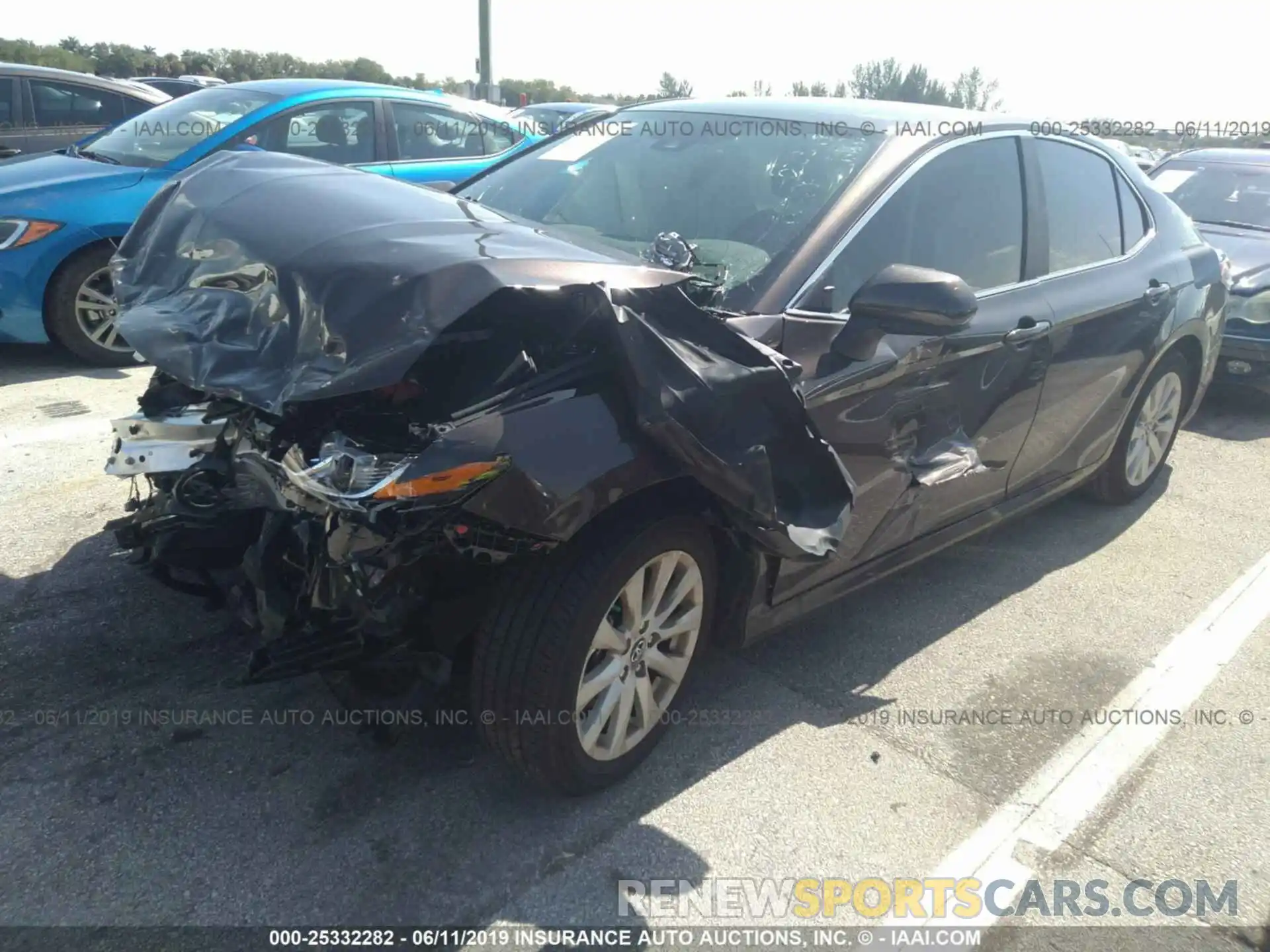 2 Photograph of a damaged car 4T1B11HK0KU208386 TOYOTA CAMRY 2019