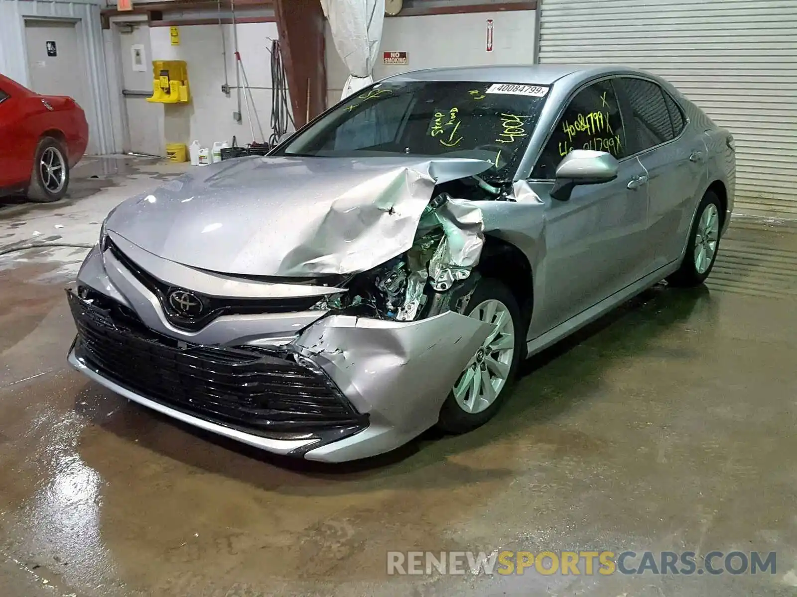 2 Photograph of a damaged car 4T1B11HK0KU208629 TOYOTA CAMRY 2019