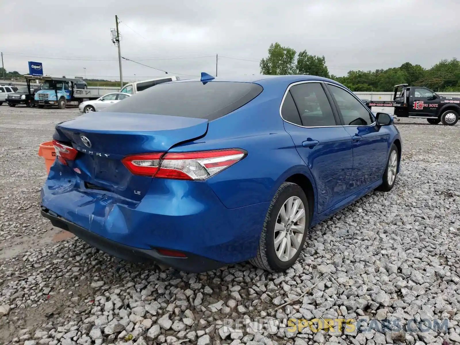 4 Photograph of a damaged car 4T1B11HK0KU209599 TOYOTA CAMRY 2019