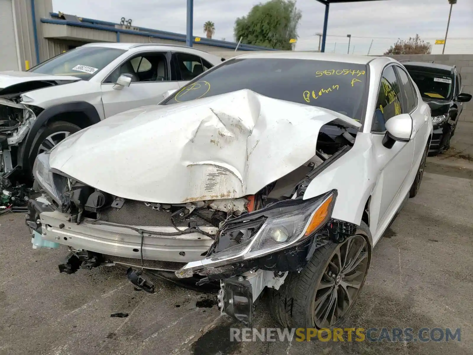 2 Photograph of a damaged car 4T1B11HK0KU209909 TOYOTA CAMRY 2019