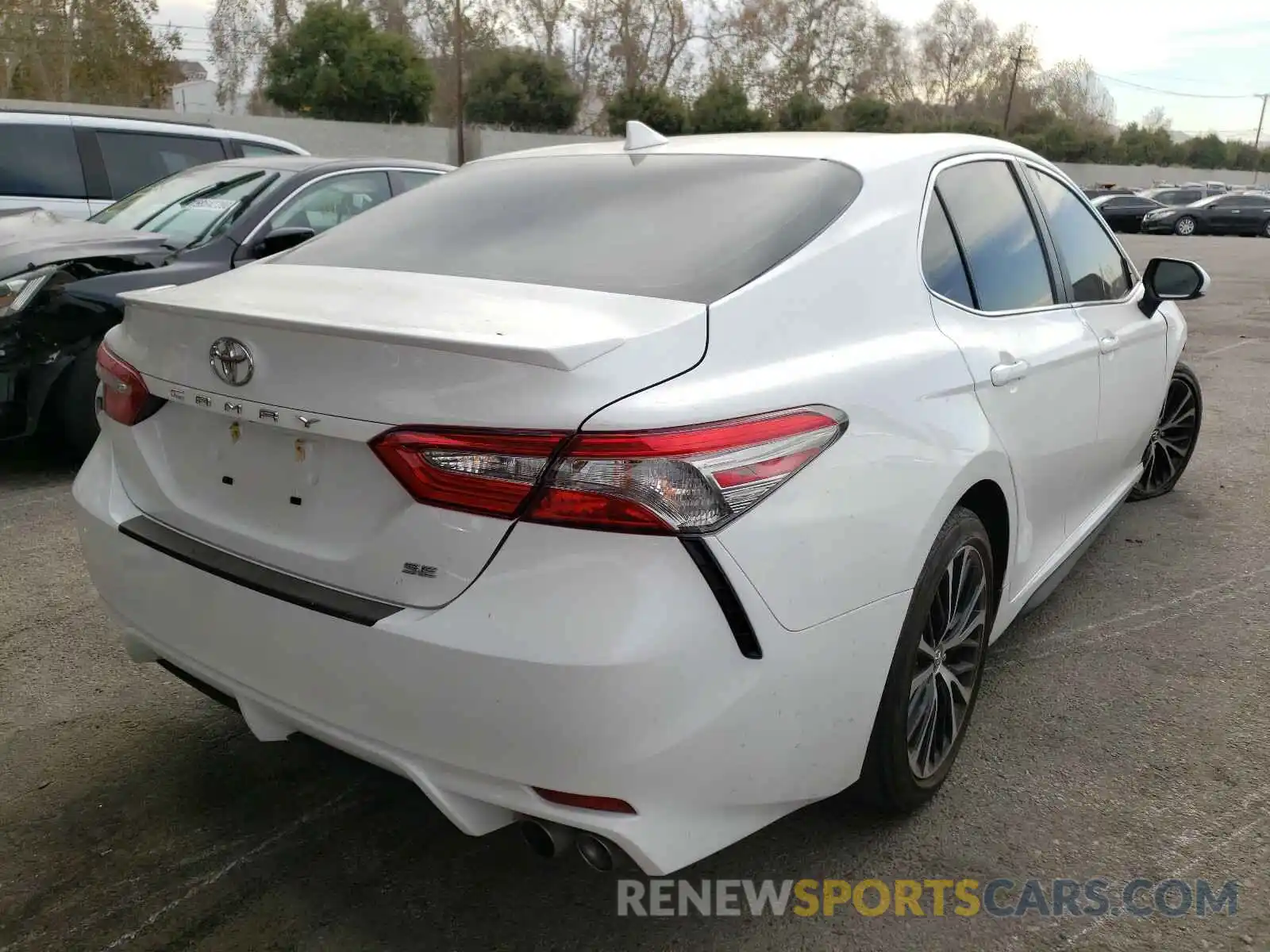 4 Photograph of a damaged car 4T1B11HK0KU209909 TOYOTA CAMRY 2019