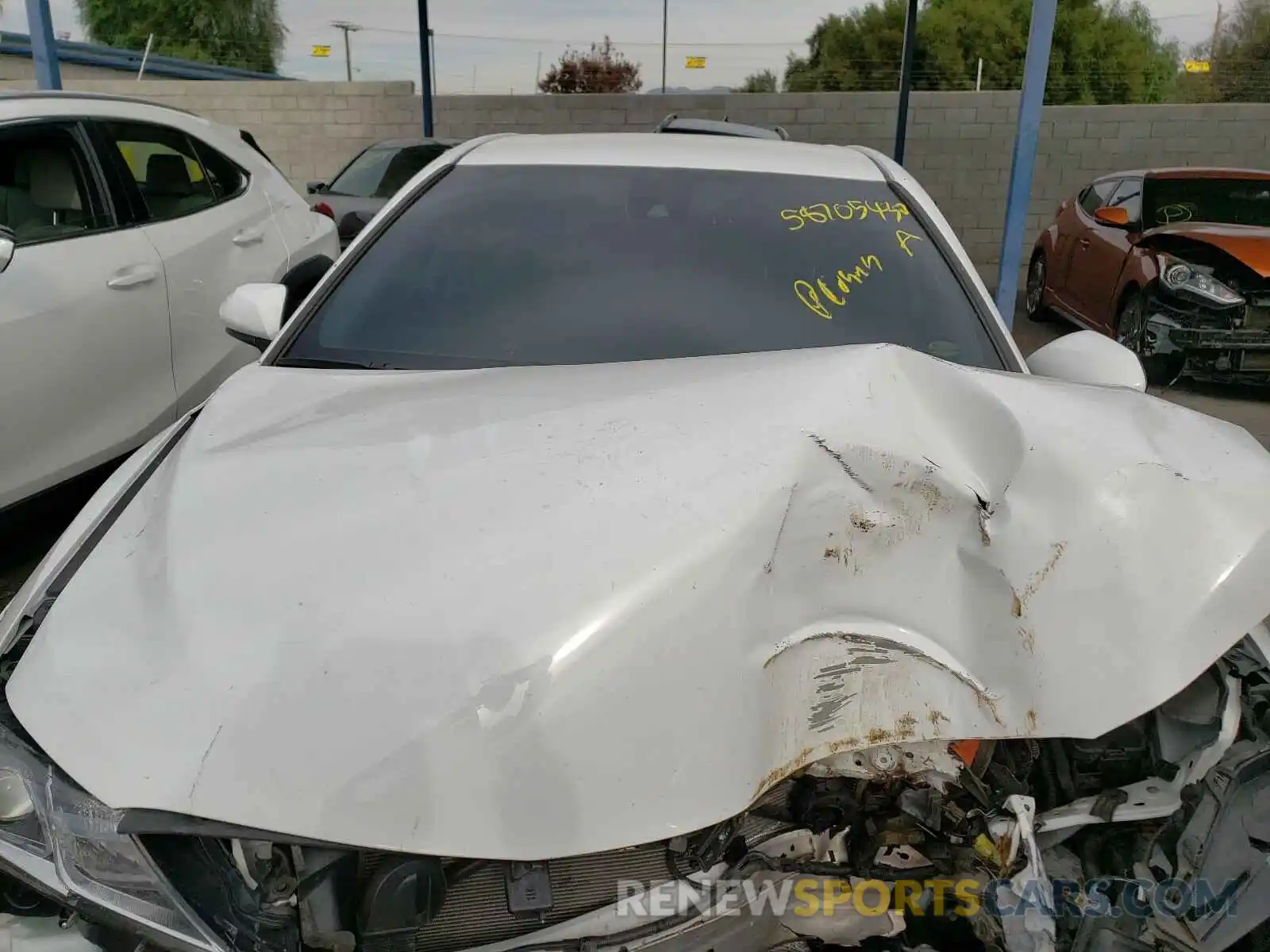 7 Photograph of a damaged car 4T1B11HK0KU209909 TOYOTA CAMRY 2019