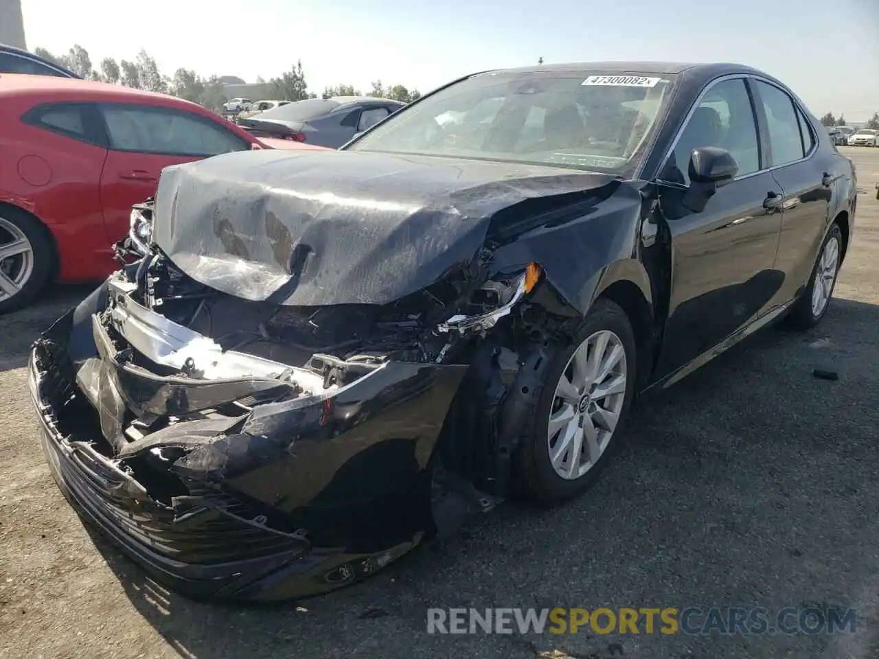 2 Photograph of a damaged car 4T1B11HK0KU212373 TOYOTA CAMRY 2019