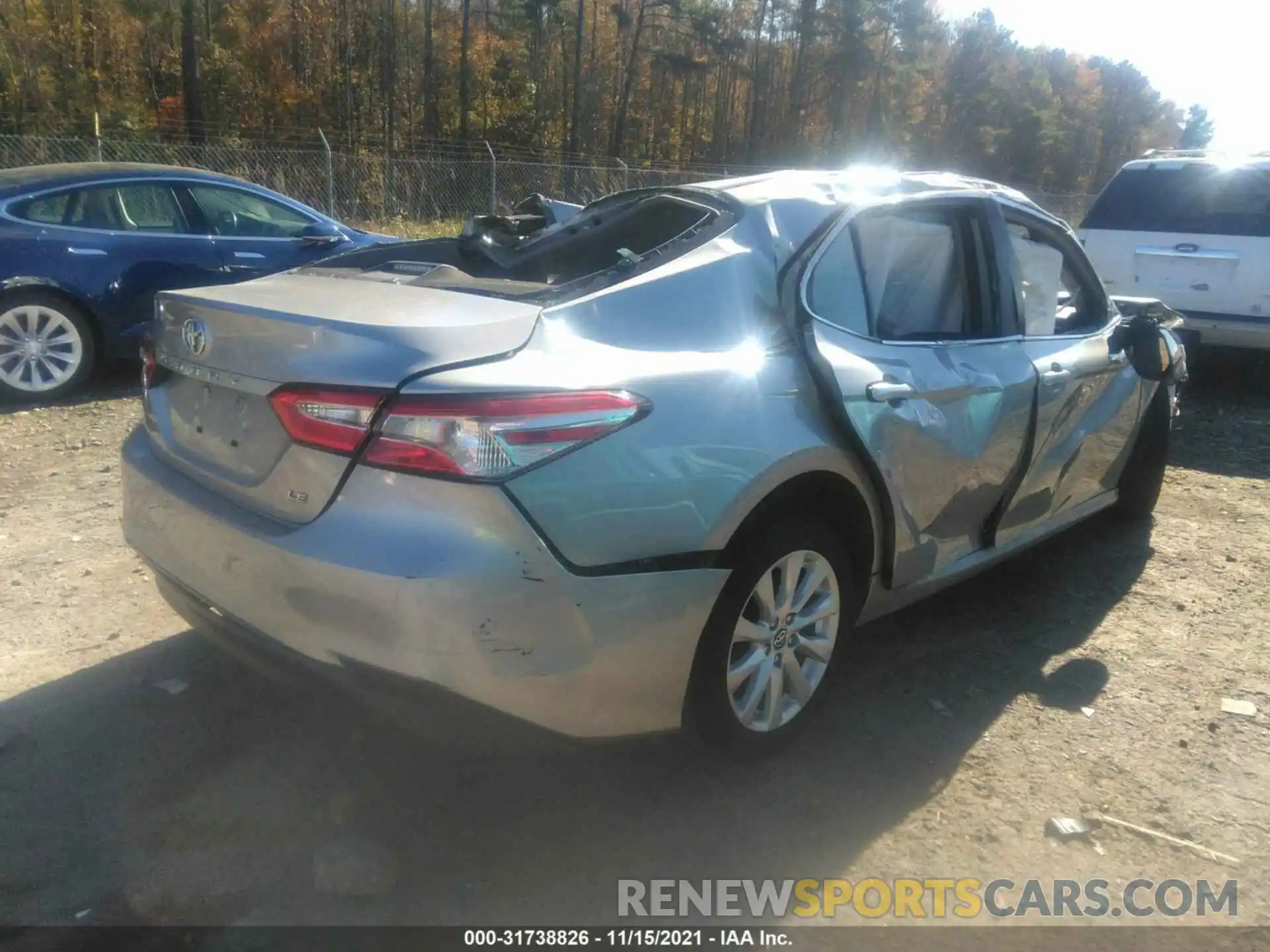 4 Photograph of a damaged car 4T1B11HK0KU213748 TOYOTA CAMRY 2019