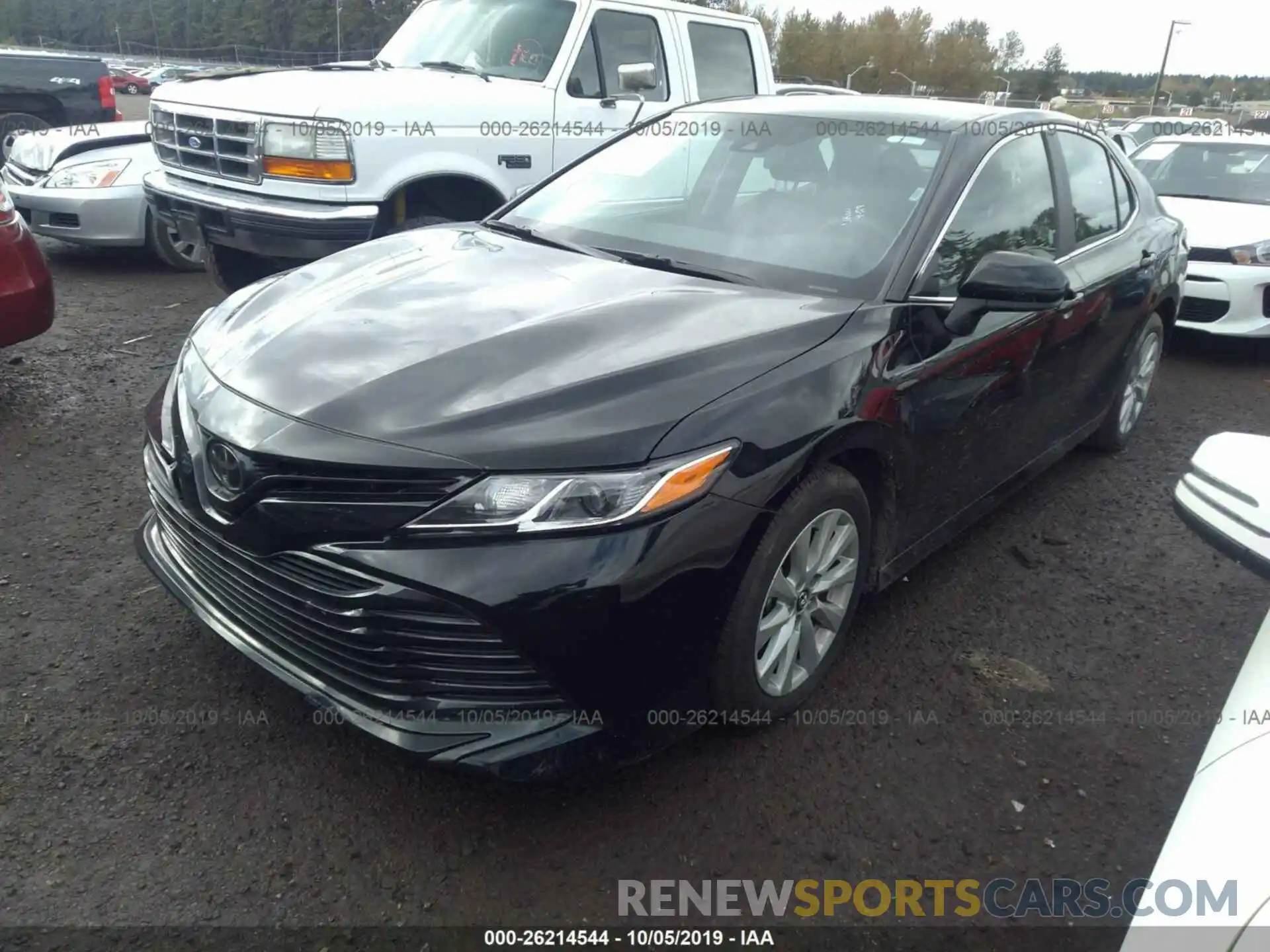 2 Photograph of a damaged car 4T1B11HK0KU214916 TOYOTA CAMRY 2019