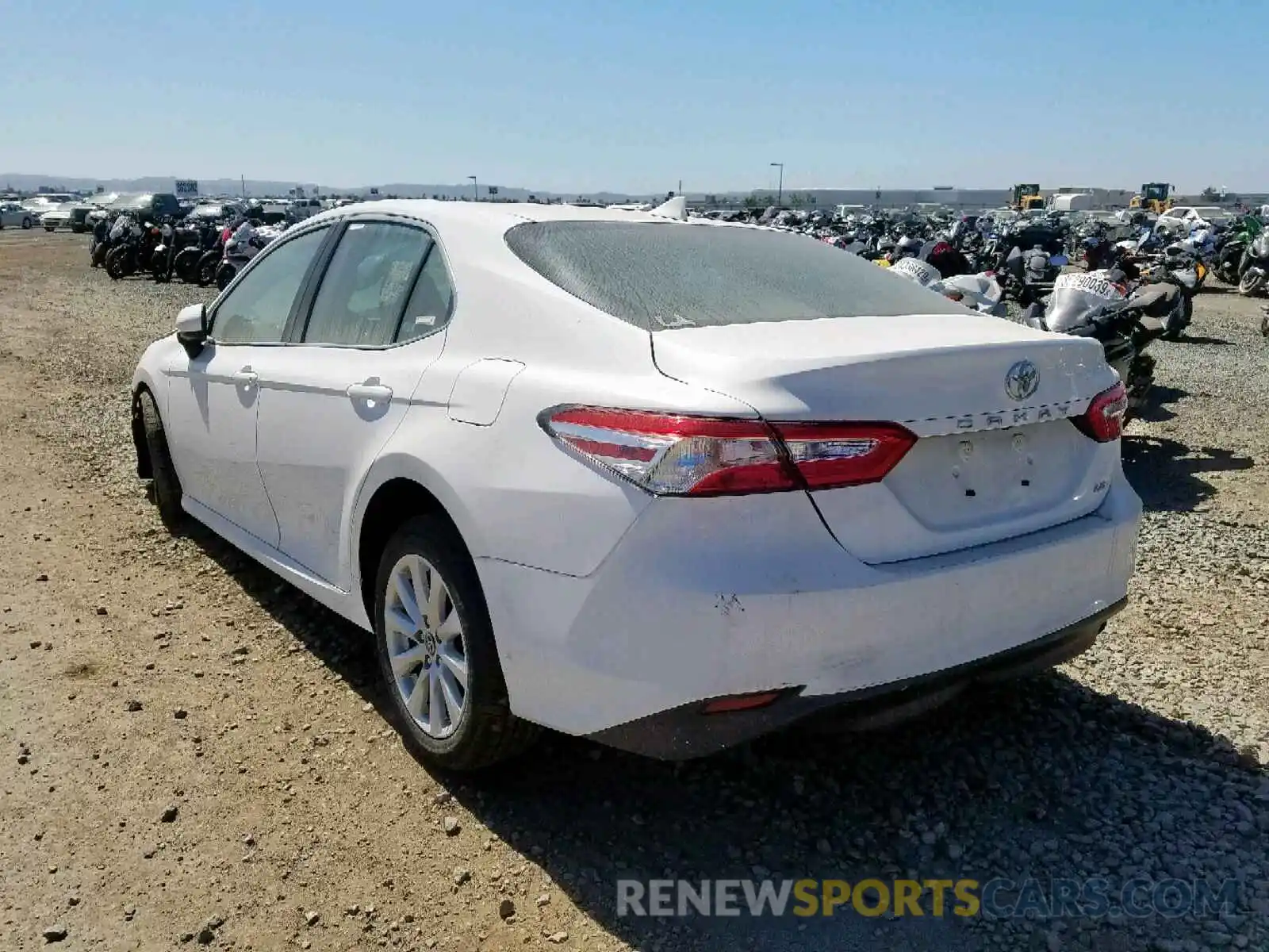 3 Photograph of a damaged car 4T1B11HK0KU219369 TOYOTA CAMRY 2019