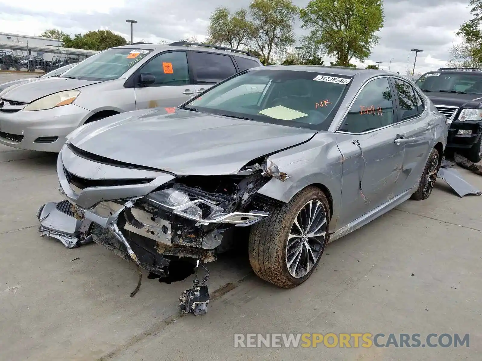 2 Photograph of a damaged car 4T1B11HK0KU220666 TOYOTA CAMRY 2019