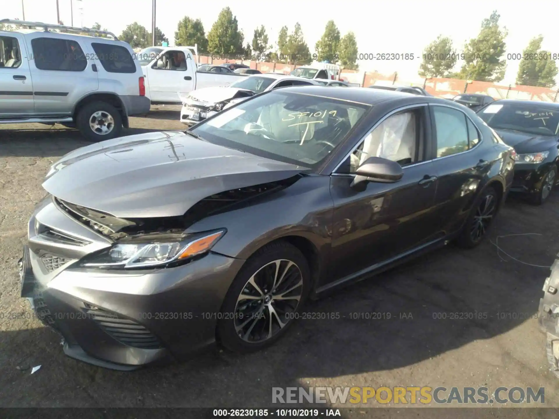 2 Photograph of a damaged car 4T1B11HK0KU220960 TOYOTA CAMRY 2019