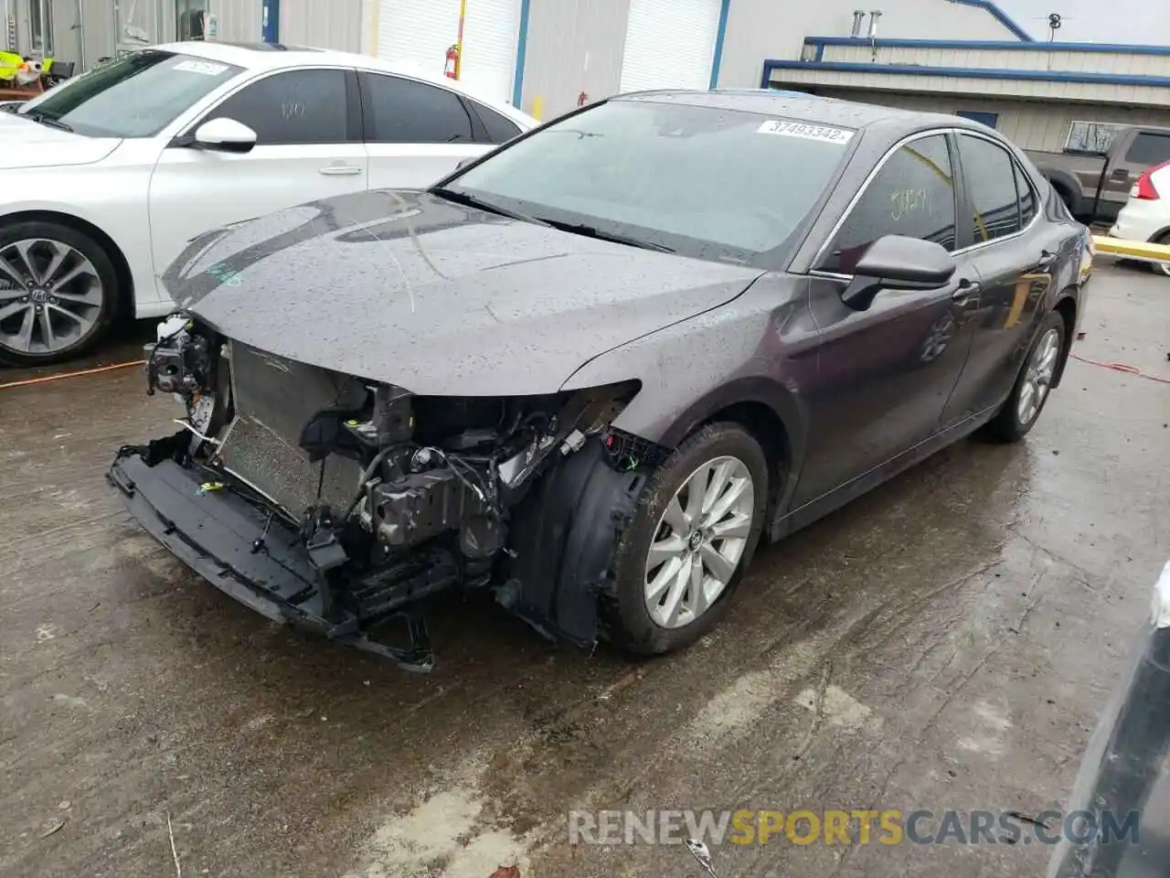 2 Photograph of a damaged car 4T1B11HK0KU222613 TOYOTA CAMRY 2019