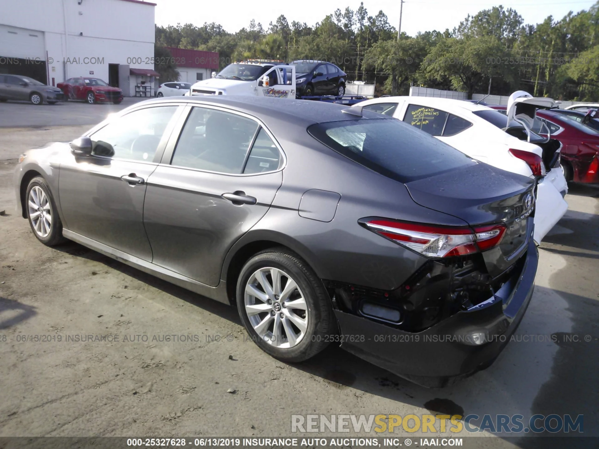 3 Photograph of a damaged car 4T1B11HK0KU227021 TOYOTA CAMRY 2019