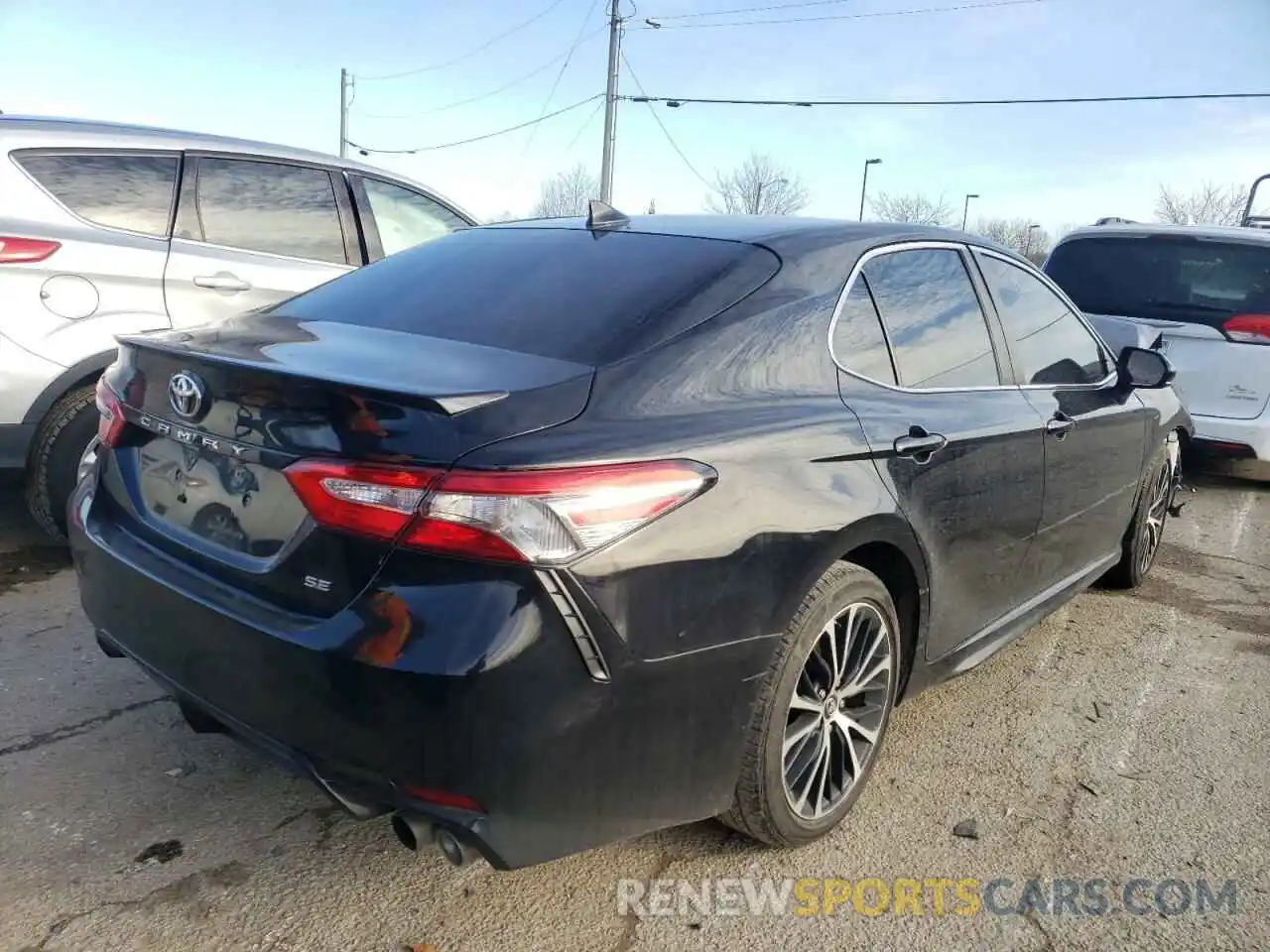 4 Photograph of a damaged car 4T1B11HK0KU227925 TOYOTA CAMRY 2019