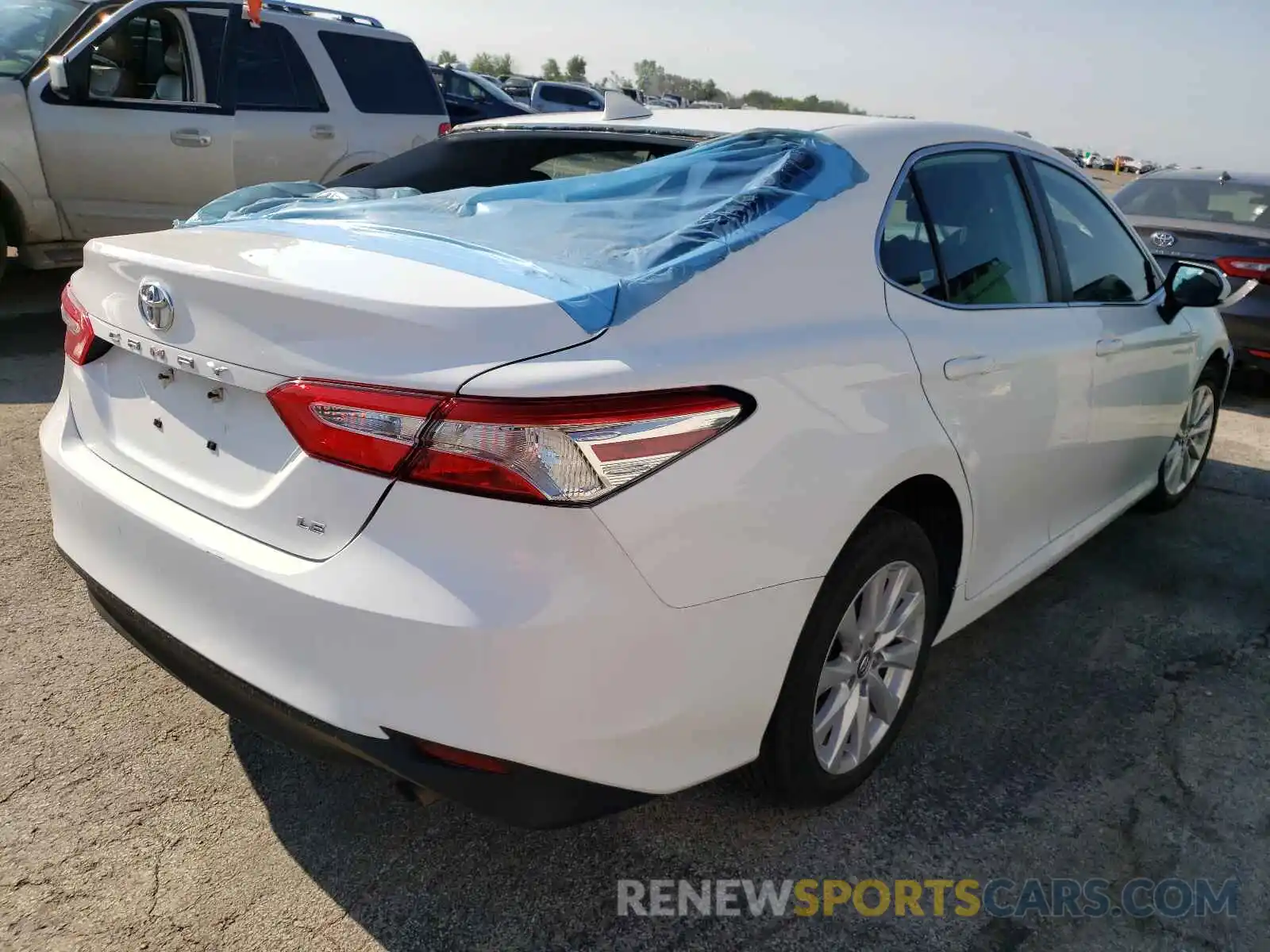 4 Photograph of a damaged car 4T1B11HK0KU228430 TOYOTA CAMRY 2019