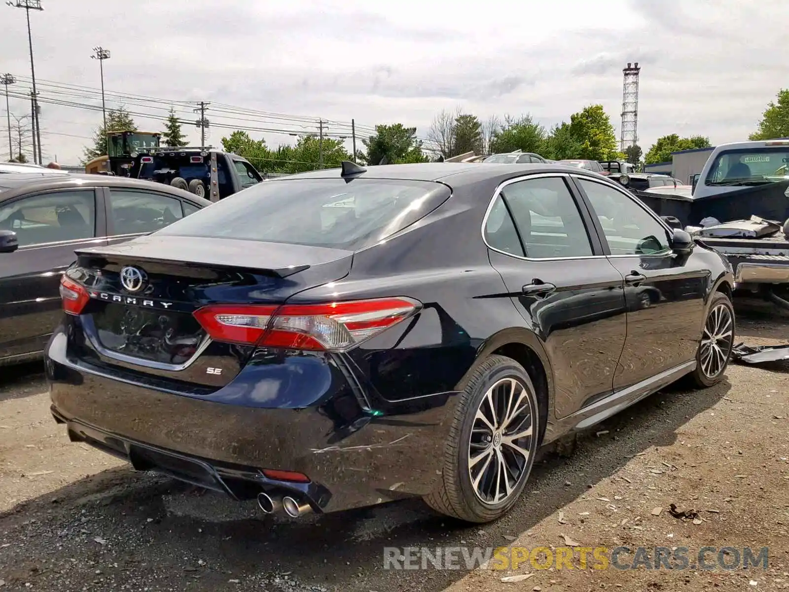 4 Photograph of a damaged car 4T1B11HK0KU229710 TOYOTA CAMRY 2019