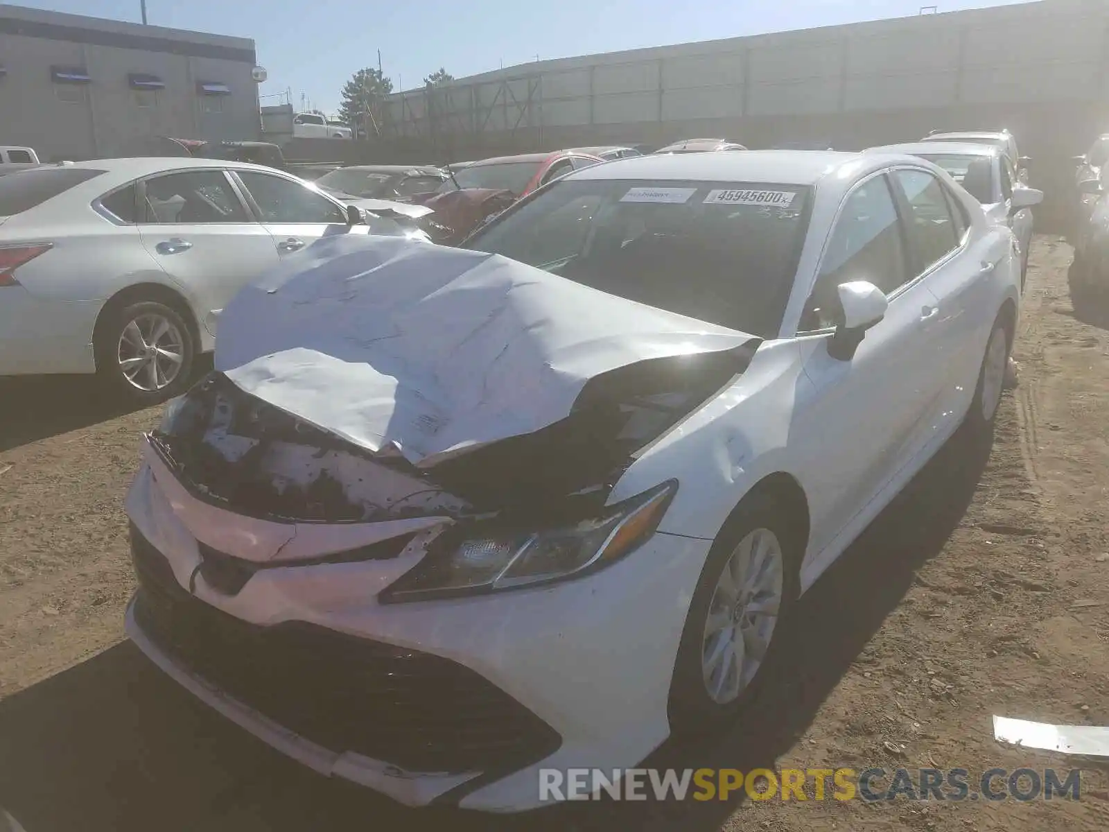 2 Photograph of a damaged car 4T1B11HK0KU233918 TOYOTA CAMRY 2019