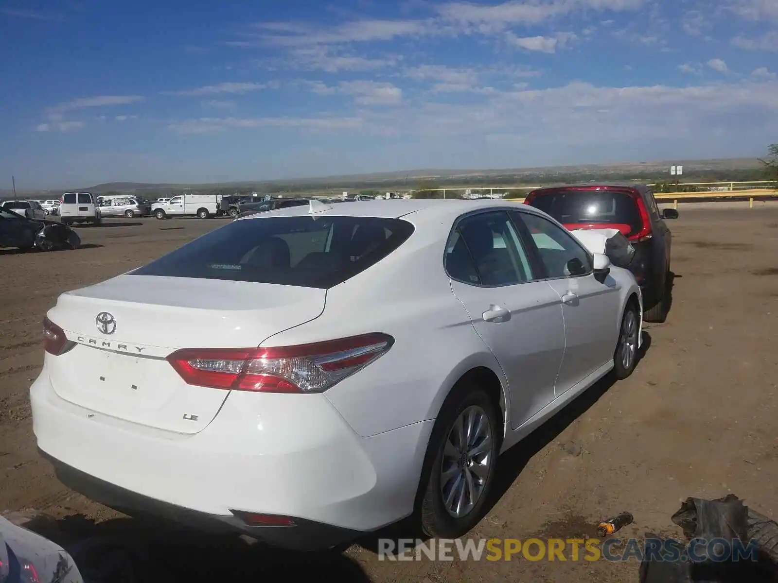 4 Photograph of a damaged car 4T1B11HK0KU233918 TOYOTA CAMRY 2019