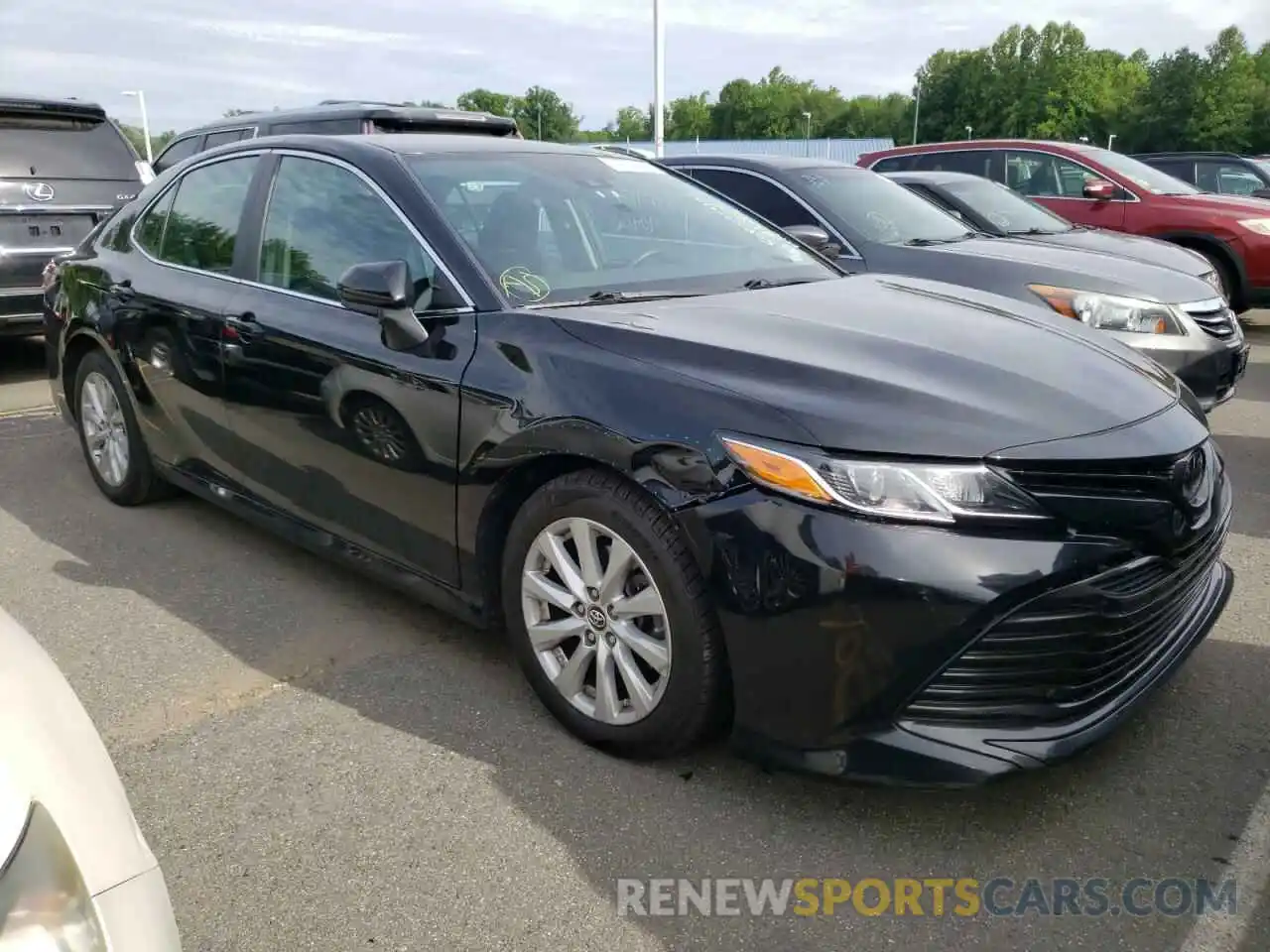 1 Photograph of a damaged car 4T1B11HK0KU235989 TOYOTA CAMRY 2019