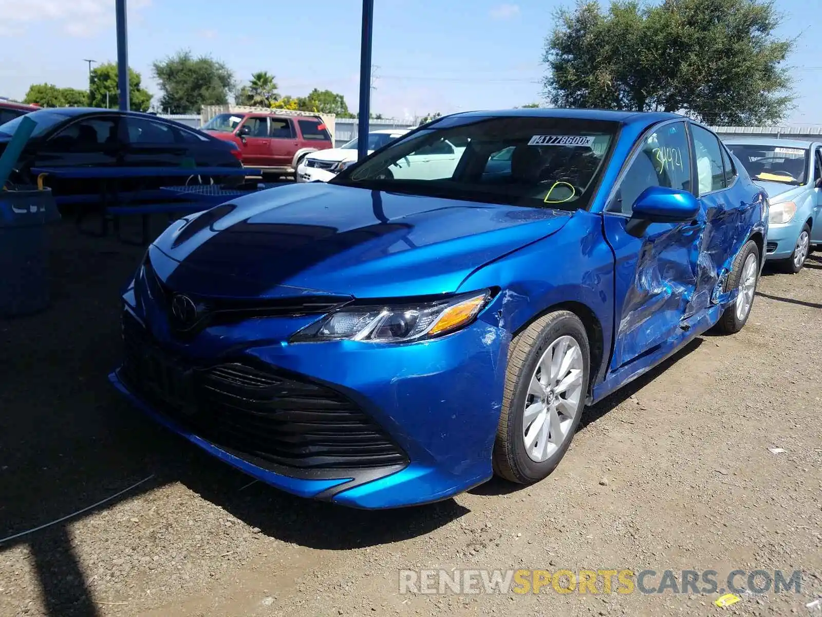 2 Photograph of a damaged car 4T1B11HK0KU236690 TOYOTA CAMRY 2019