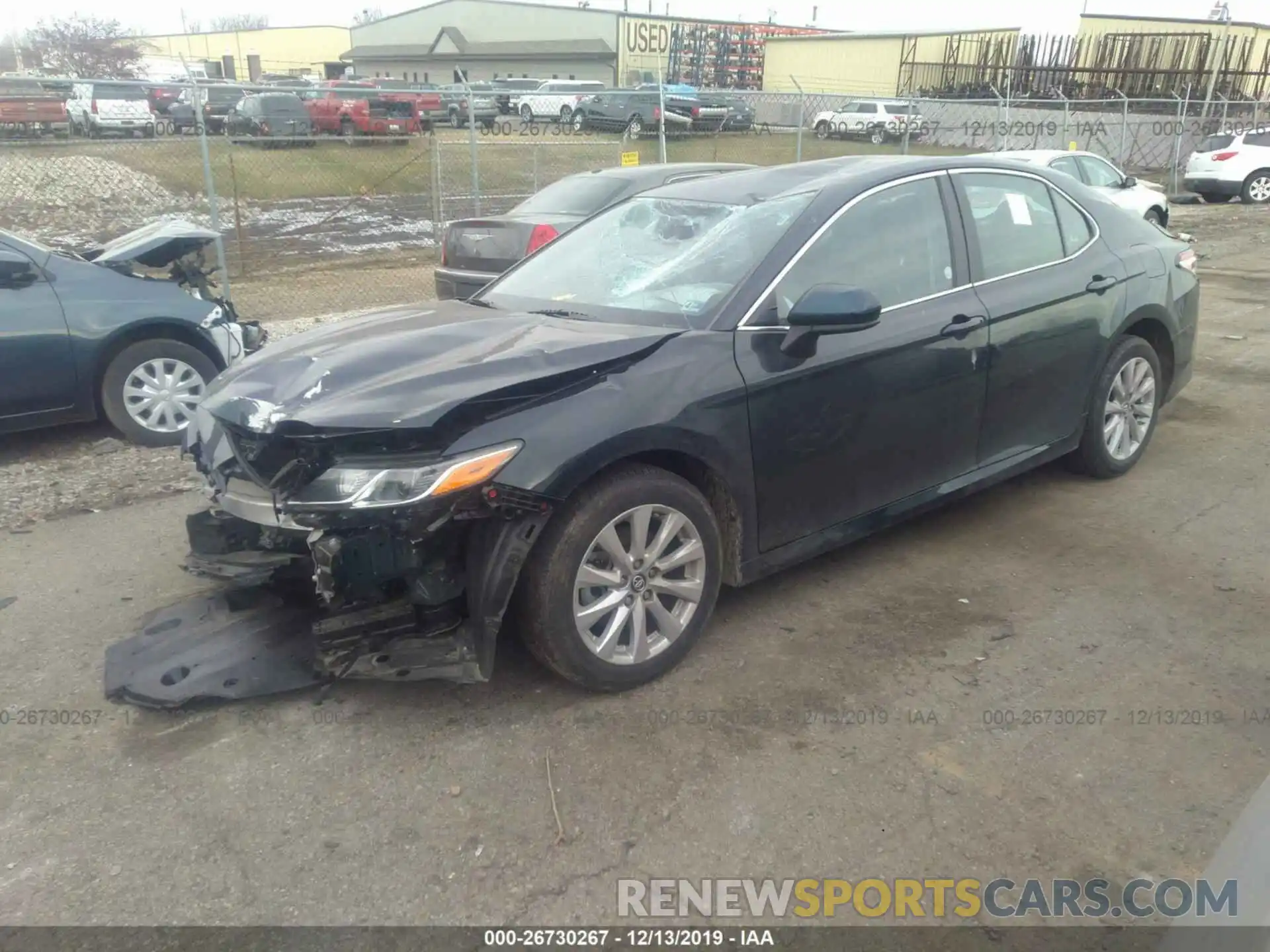 2 Photograph of a damaged car 4T1B11HK0KU238391 TOYOTA CAMRY 2019