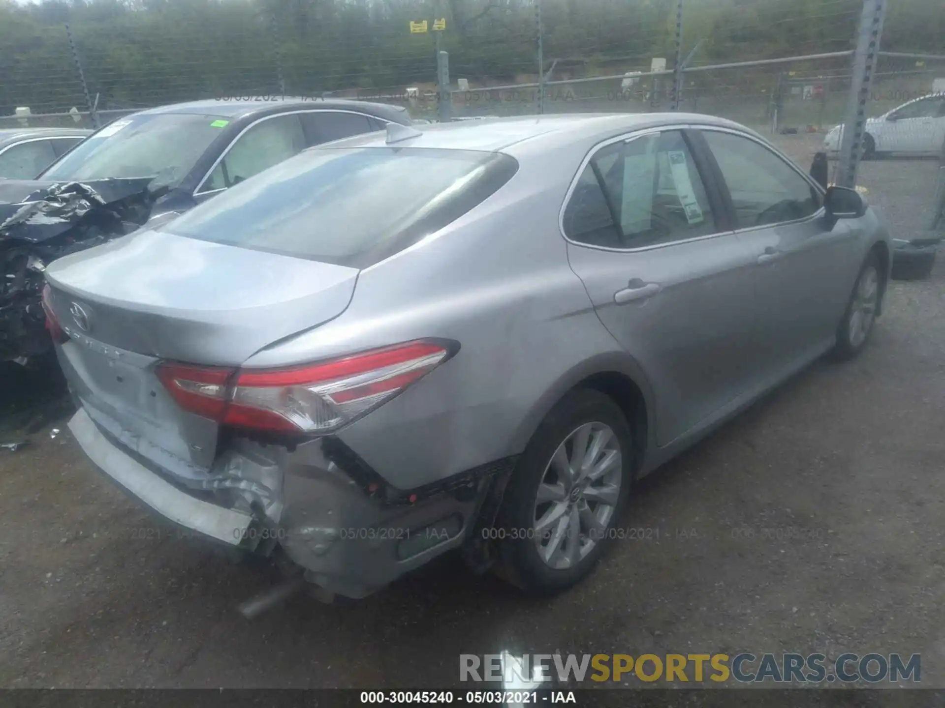 4 Photograph of a damaged car 4T1B11HK0KU239279 TOYOTA CAMRY 2019