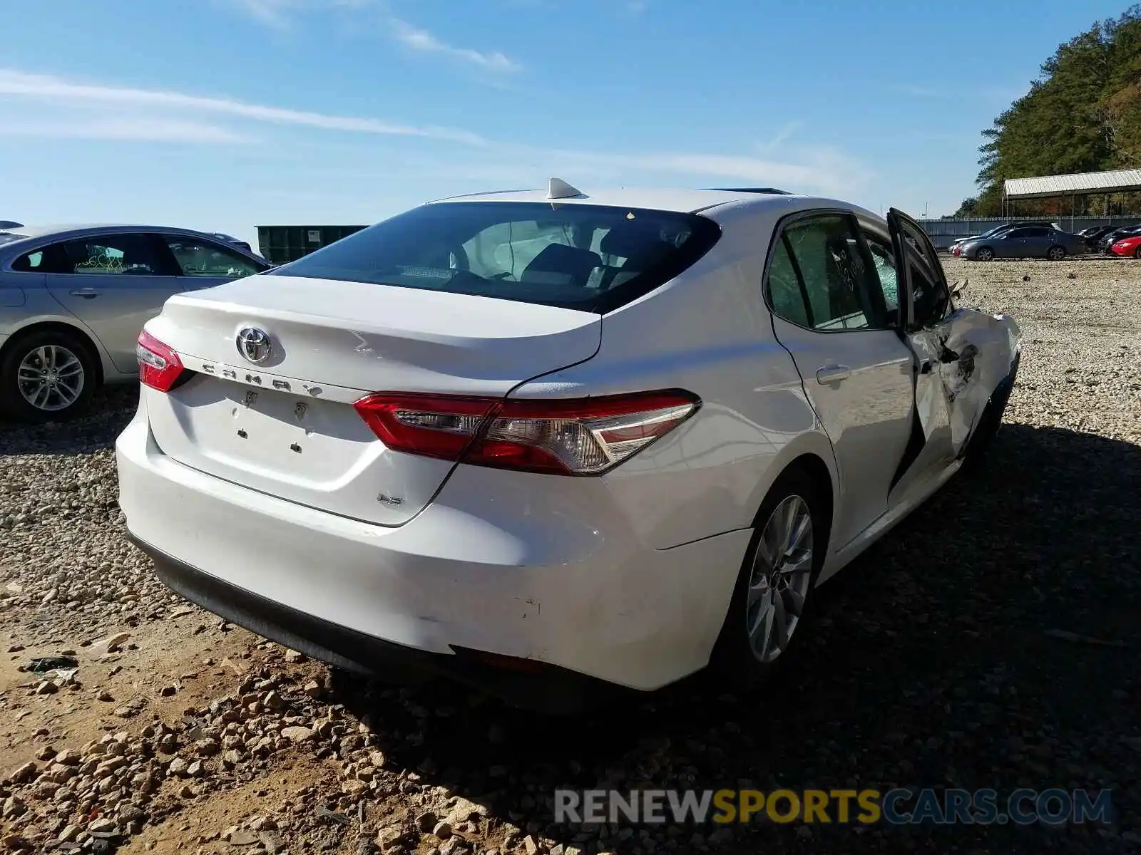 4 Photograph of a damaged car 4T1B11HK0KU239802 TOYOTA CAMRY 2019