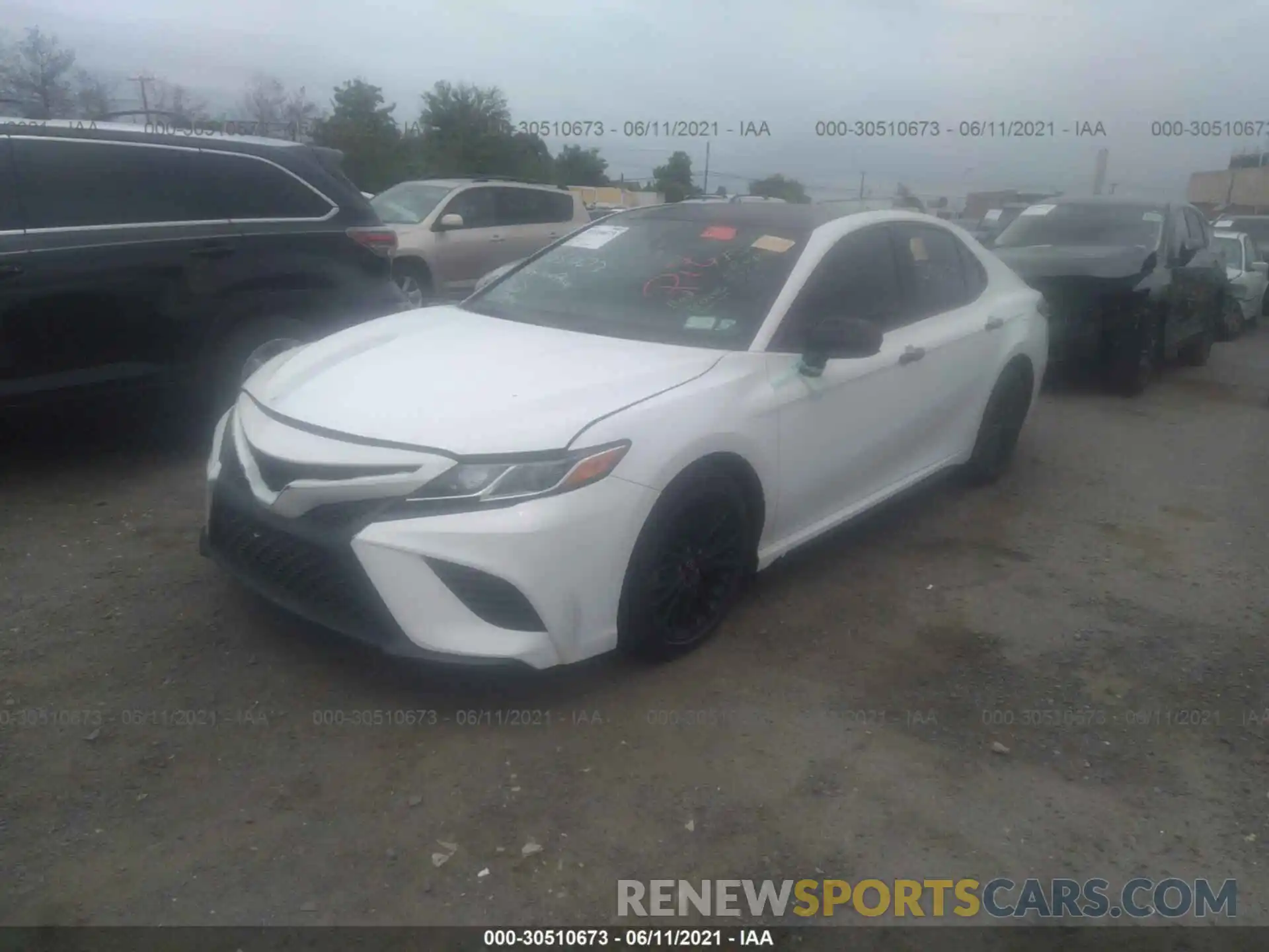 2 Photograph of a damaged car 4T1B11HK0KU240397 TOYOTA CAMRY 2019