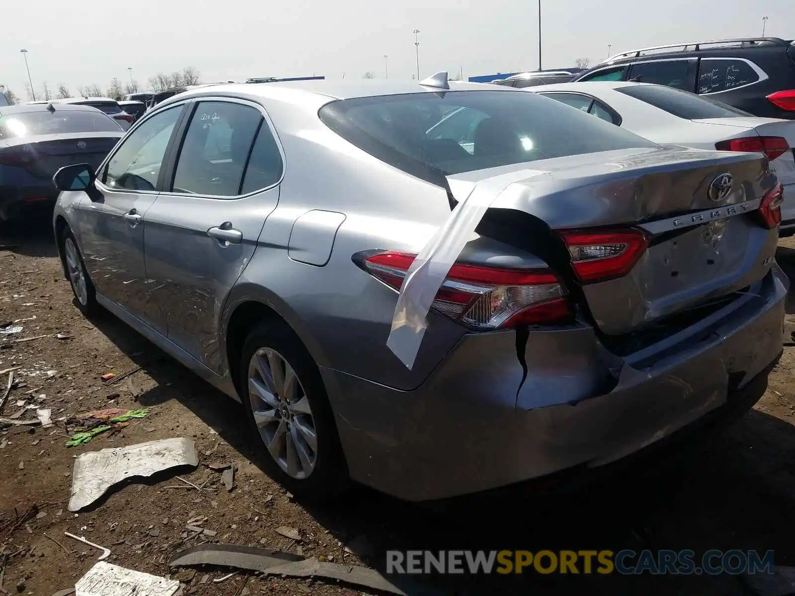 3 Photograph of a damaged car 4T1B11HK0KU241212 TOYOTA CAMRY 2019