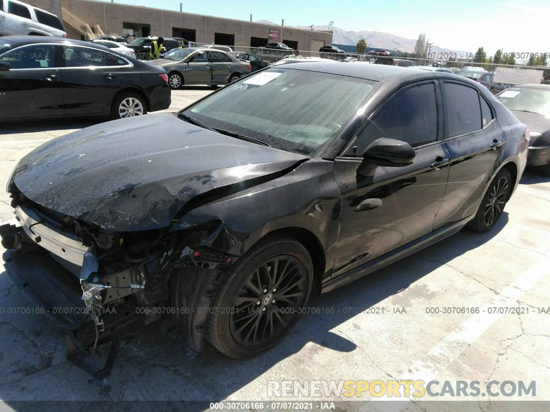 2 Photograph of a damaged car 4T1B11HK0KU241310 TOYOTA CAMRY 2019