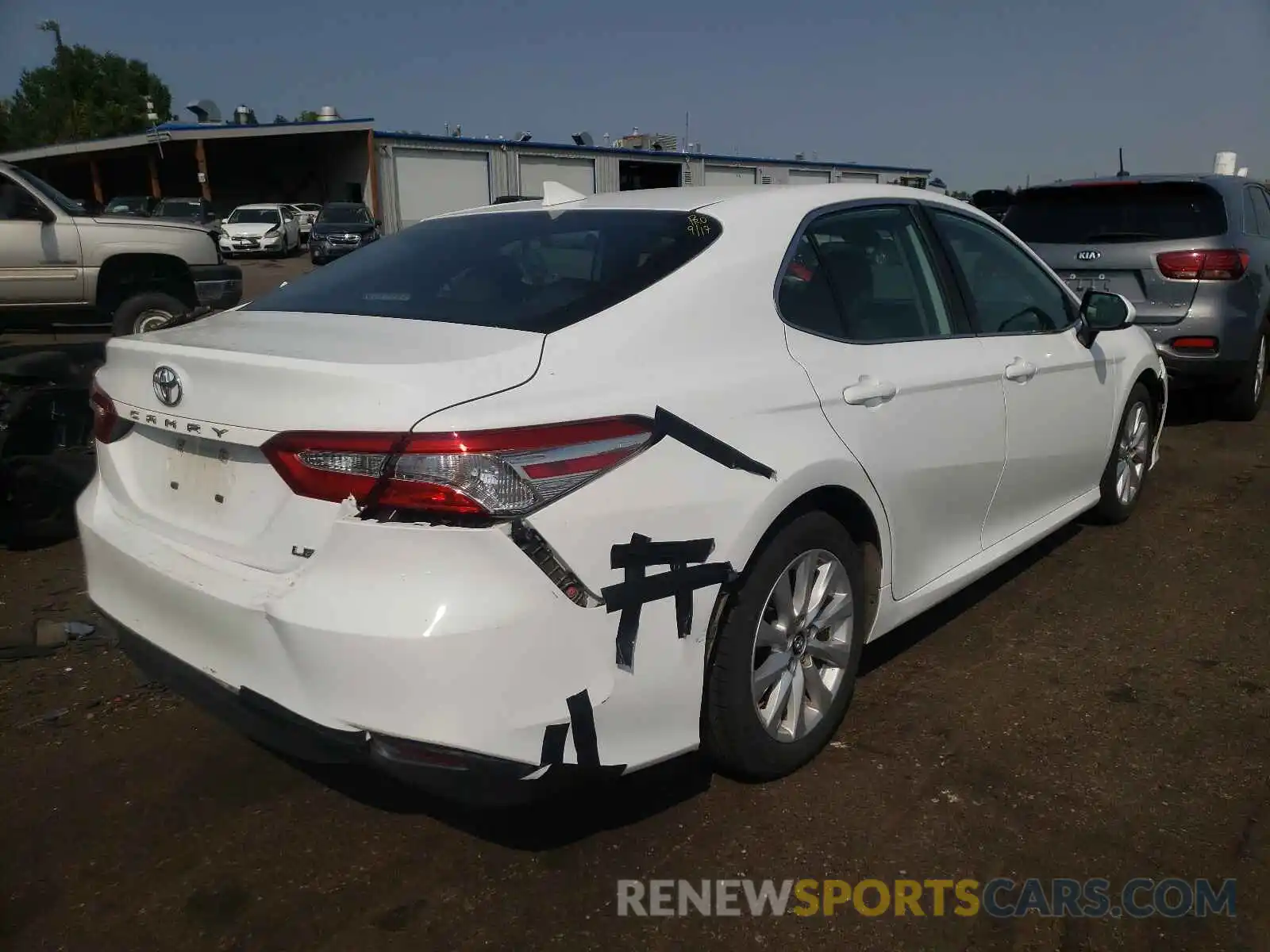 4 Photograph of a damaged car 4T1B11HK0KU241484 TOYOTA CAMRY 2019