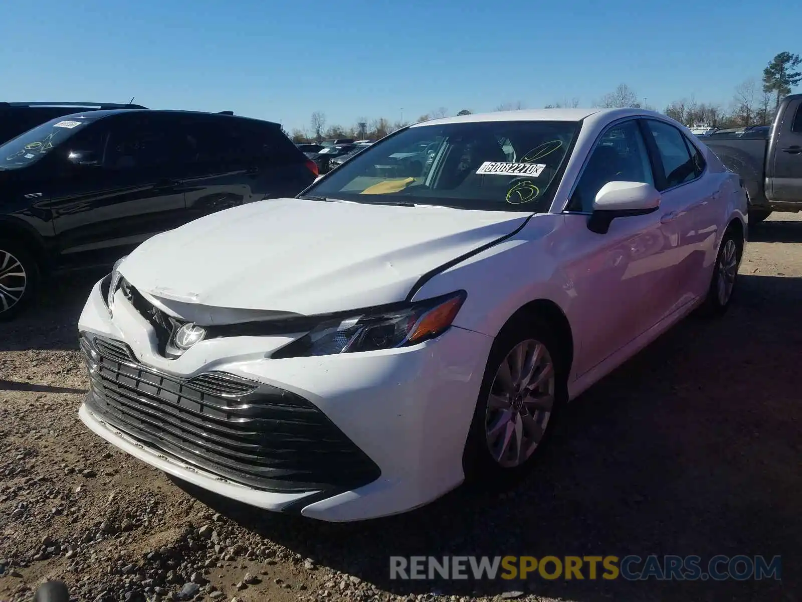 2 Photograph of a damaged car 4T1B11HK0KU243543 TOYOTA CAMRY 2019