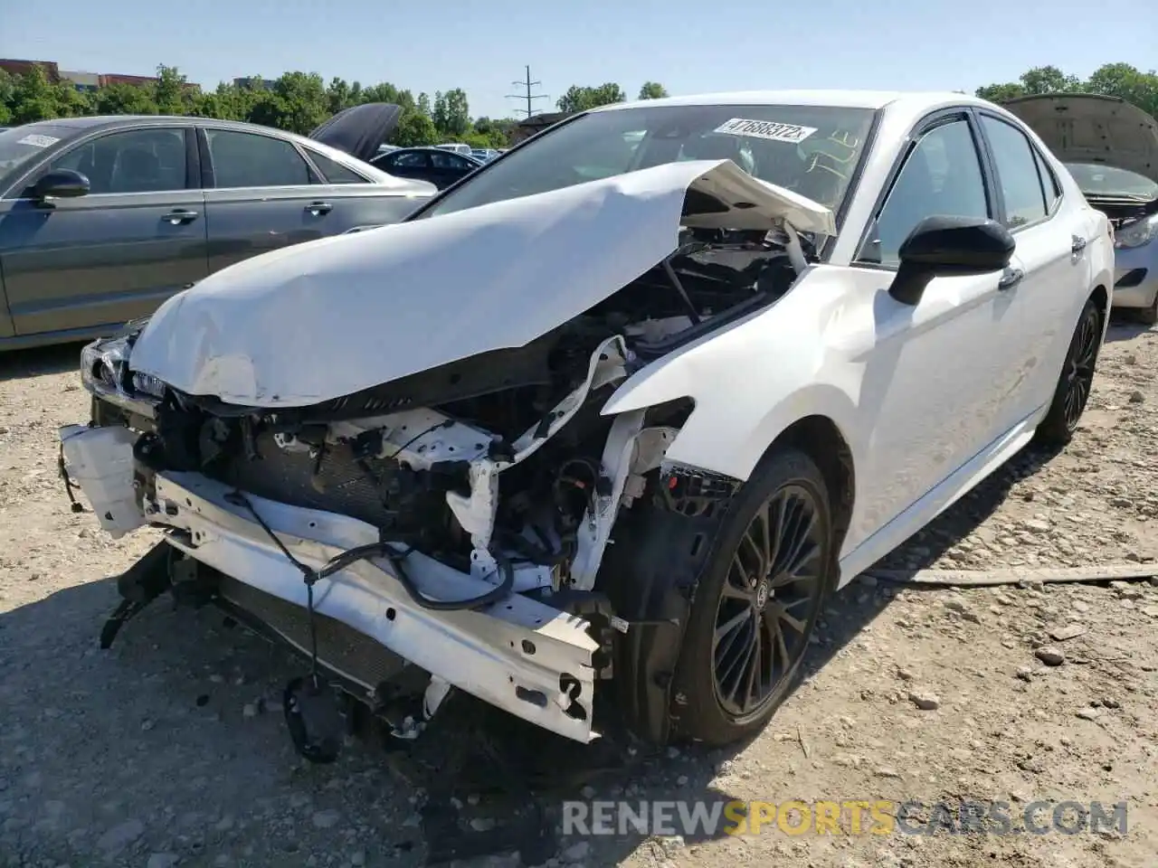 2 Photograph of a damaged car 4T1B11HK0KU243557 TOYOTA CAMRY 2019