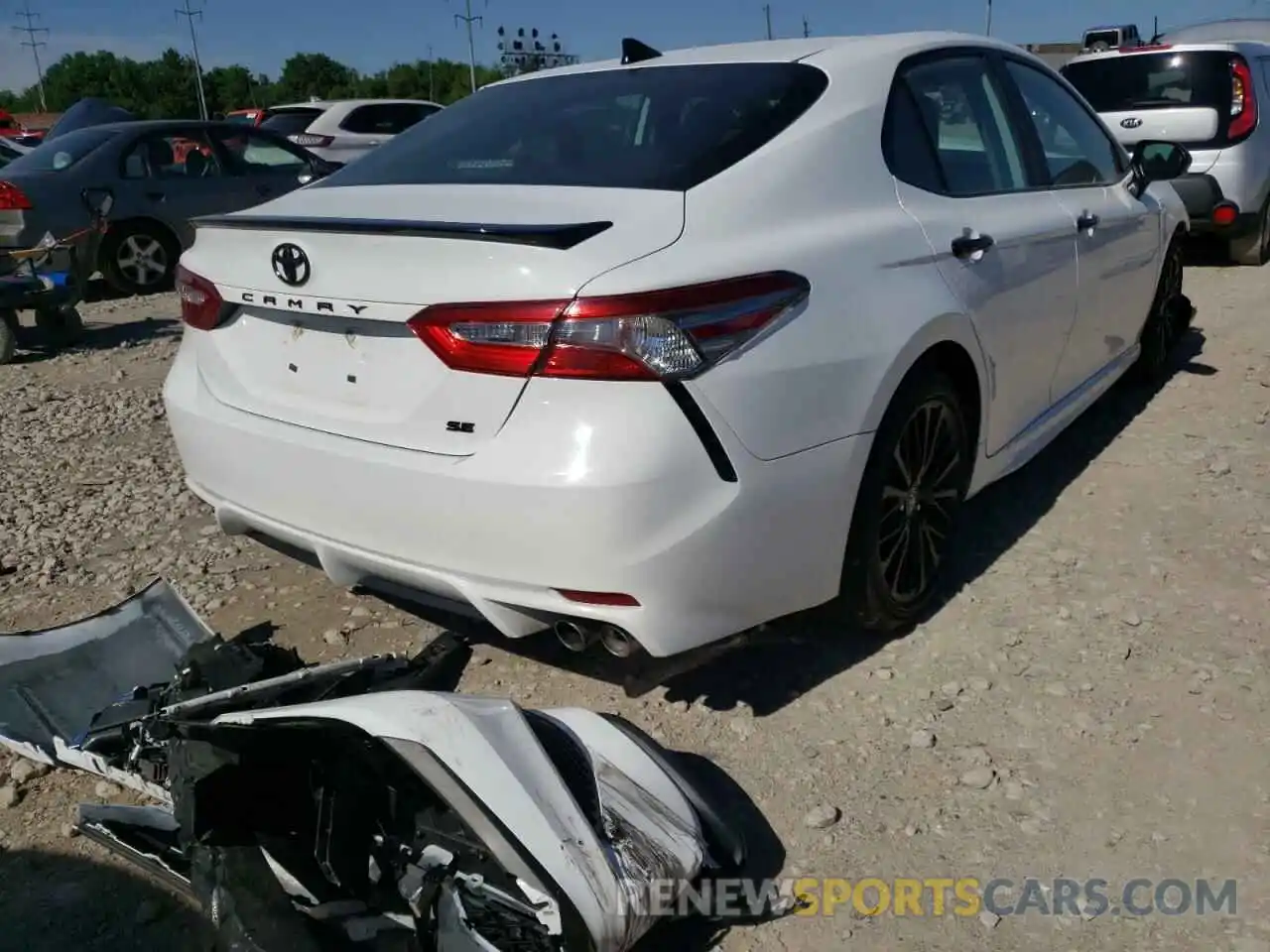 4 Photograph of a damaged car 4T1B11HK0KU243557 TOYOTA CAMRY 2019