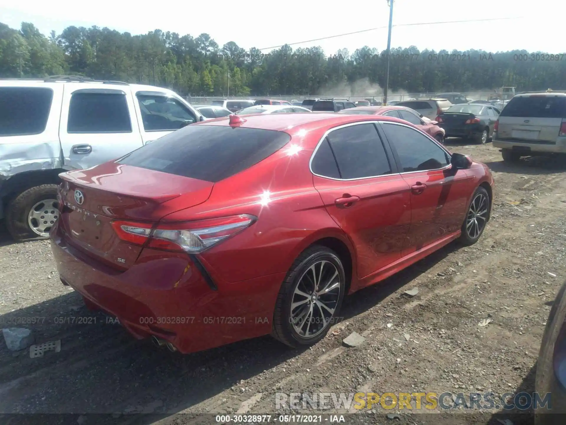 4 Photograph of a damaged car 4T1B11HK0KU244398 TOYOTA CAMRY 2019